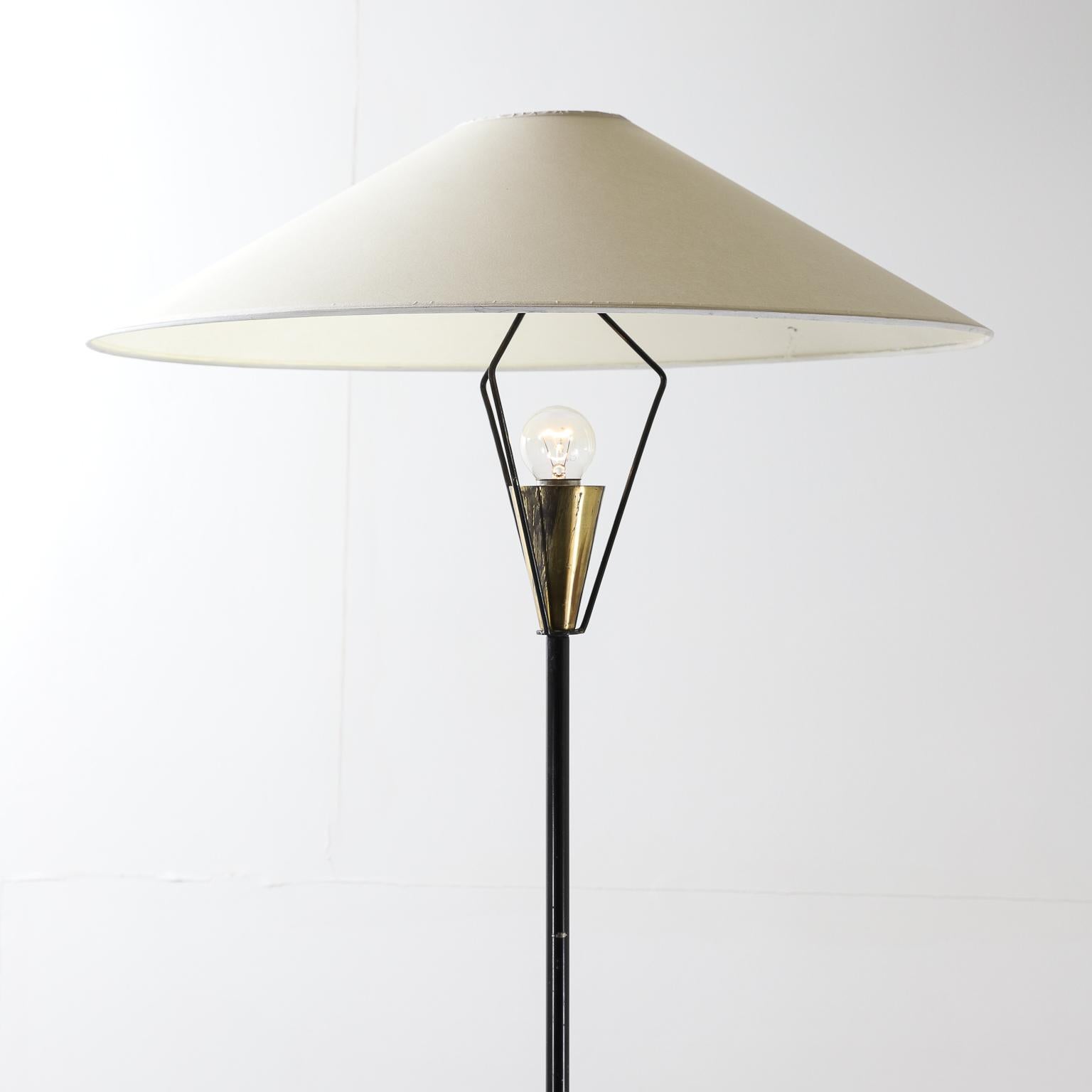 Italian midcentury blackened brass floor lamp with antique brass finished details.