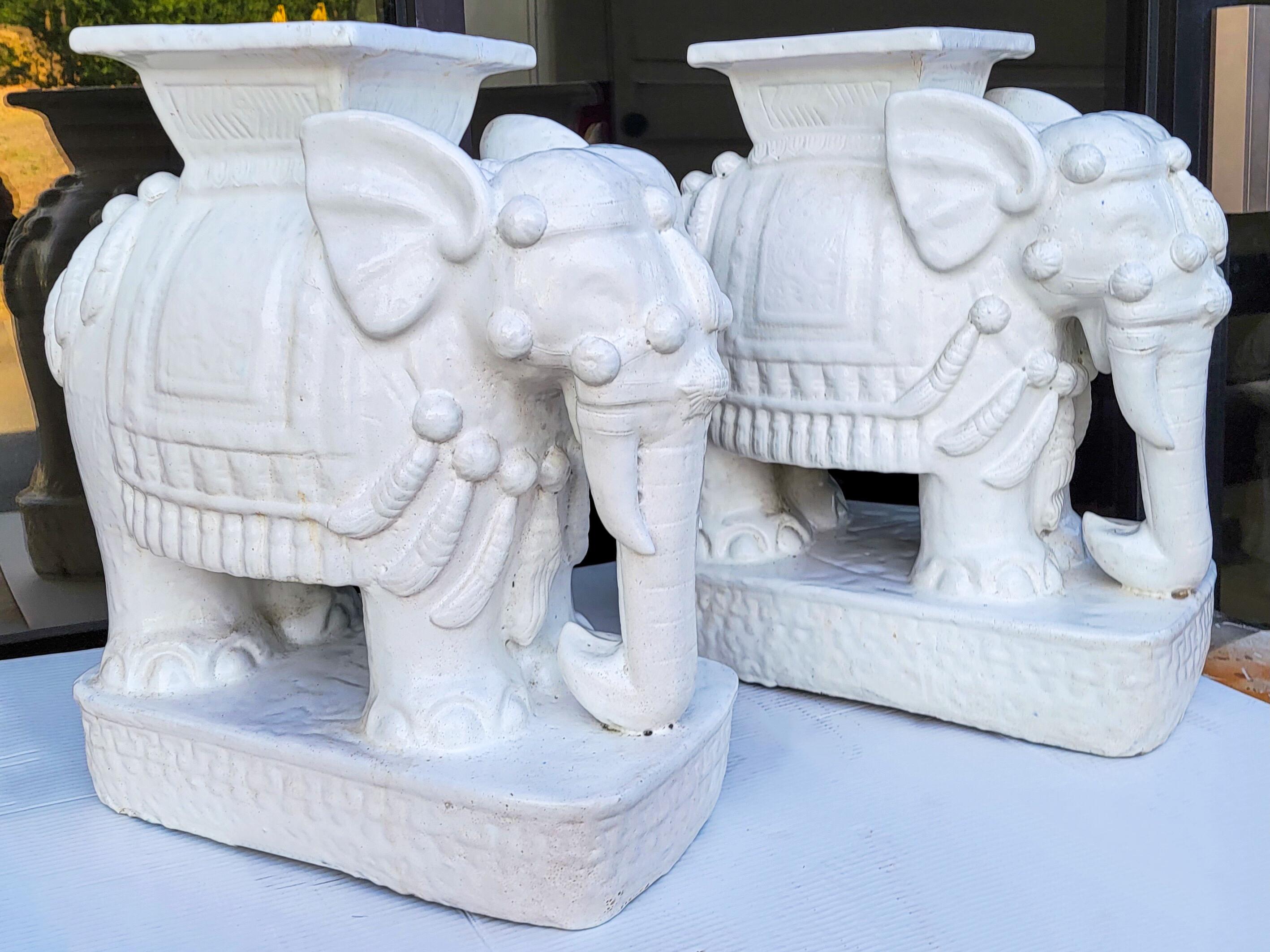 This is a large scale blanc di chine style pair of white garden elephant garden stools or side tables. The are in very good condition and date to the 1960s.

My shipping applies only to the Continental US.