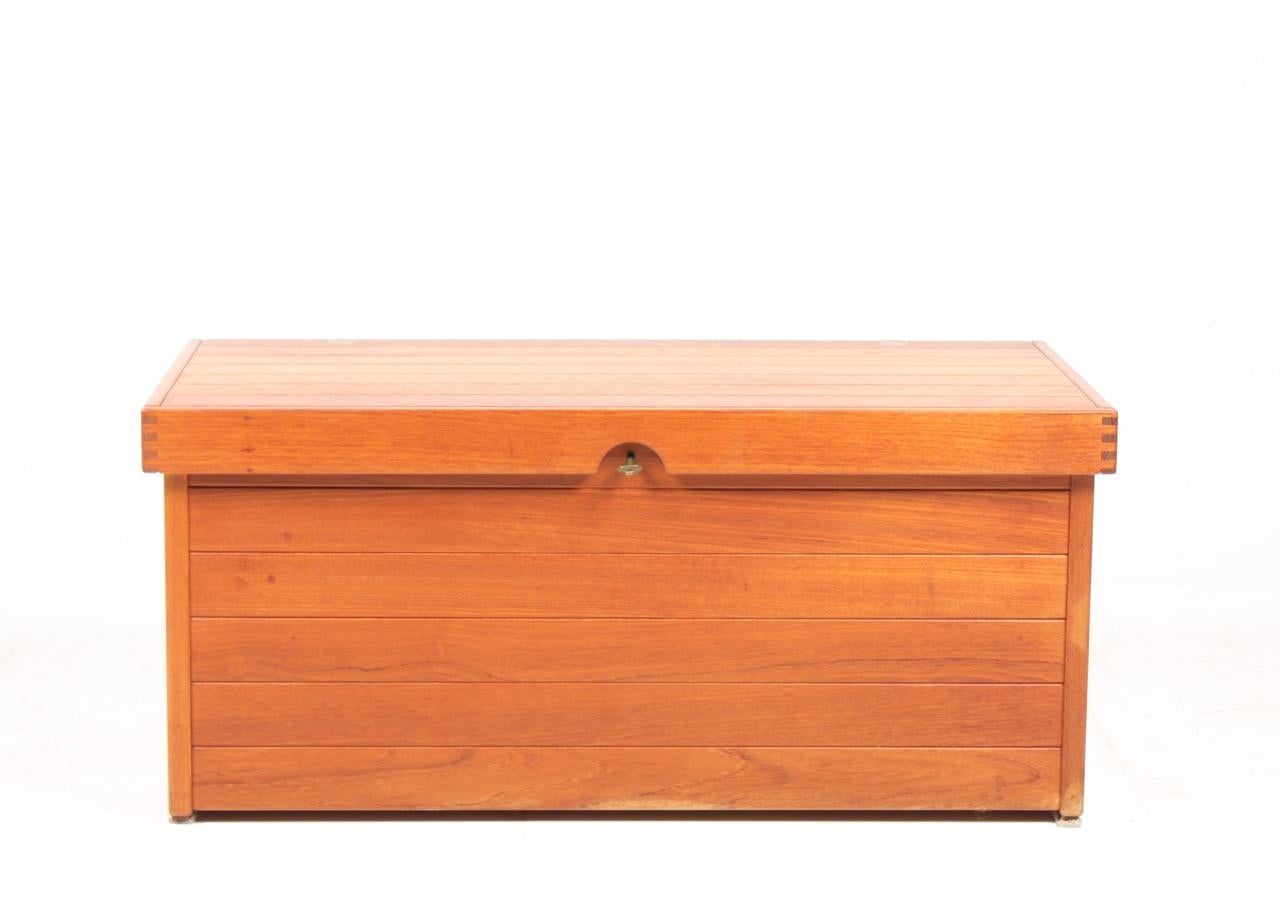 Blanket chest in teak. Designed by Kai Kristiasen and made by Aksel Kjærsgaard cabinetmakers. Made in the 1960s. Great original condition.