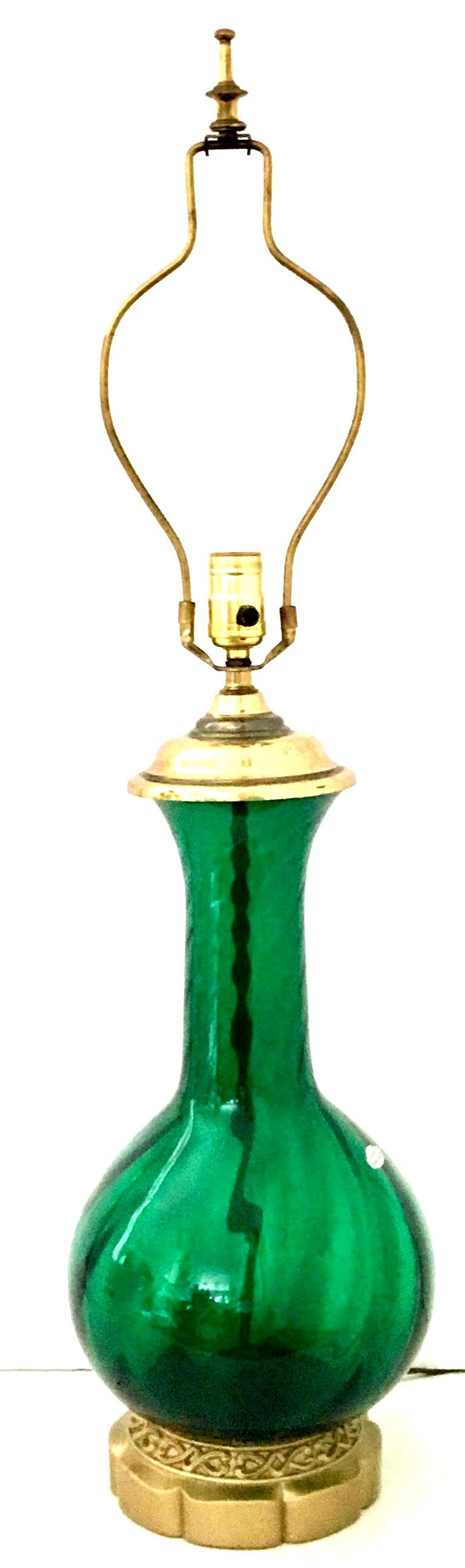 green and brass lamp