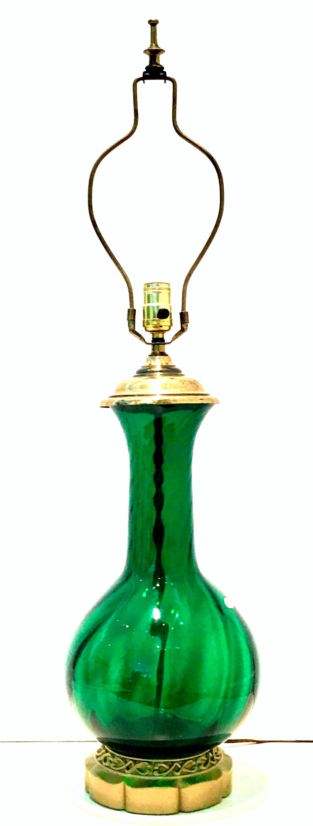 Mid-Century Blenko Glass Optic Emerald Green & Brass Mount Table Lamp. This sparkling Blenko Glass lamp maintains its original Blenko Glass silver manufacturer sticker.  Features the original brass base and fittings. Includes a brass harp and