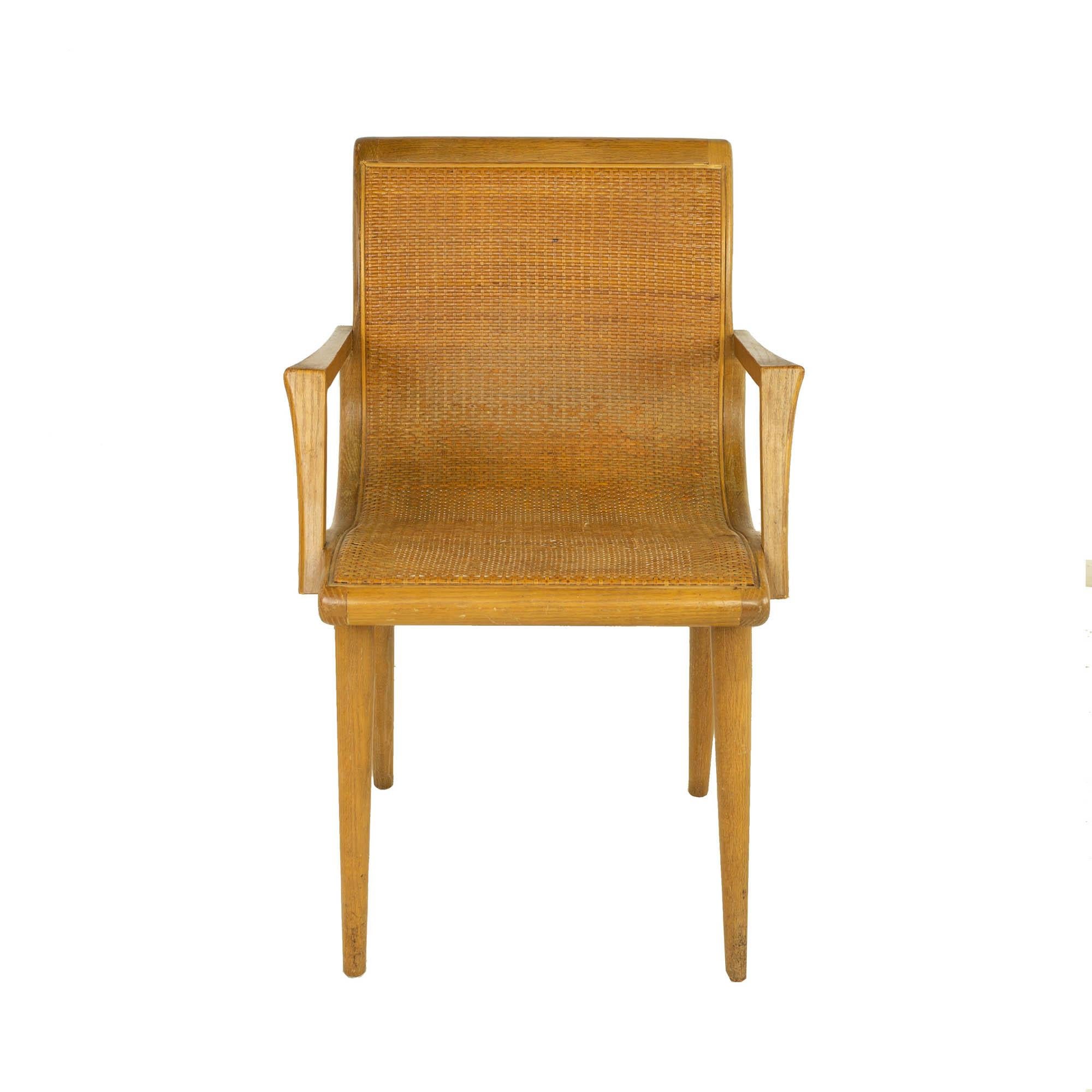 Mid Century Blonde Caned Dining Desk Chair

Chair measures: 22 wide x 22 deep x 34 high, with a seat height of 19 inches and arm height of 26 inches

?All pieces of furniture can be had in what we call restored vintage condition. That means the