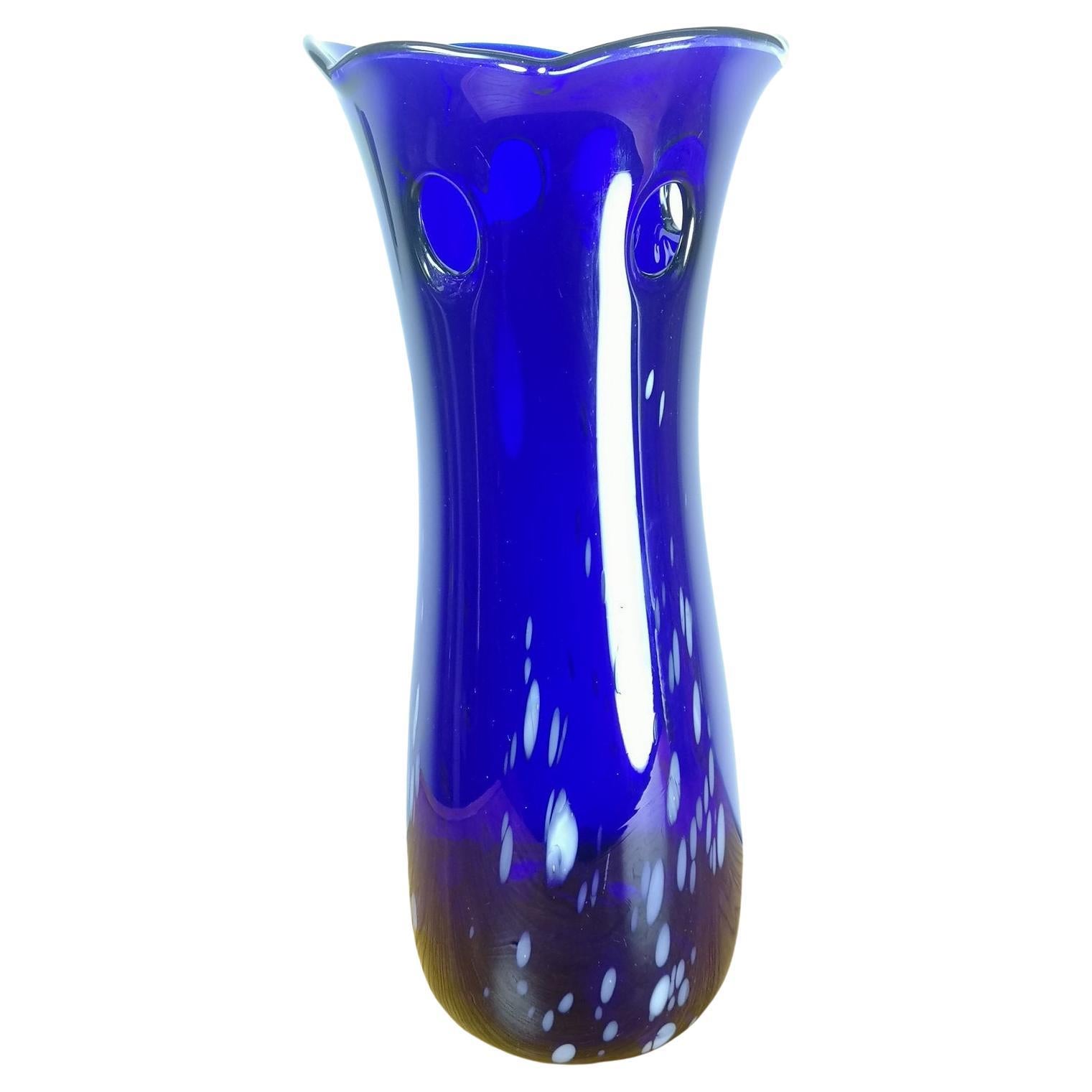 https://a.1stdibscdn.com/mid-century-blue-colored-glass-vase-for-sale/f_49541/f_348410321687177283037/f_34841032_1687177283435_bg_processed.jpg