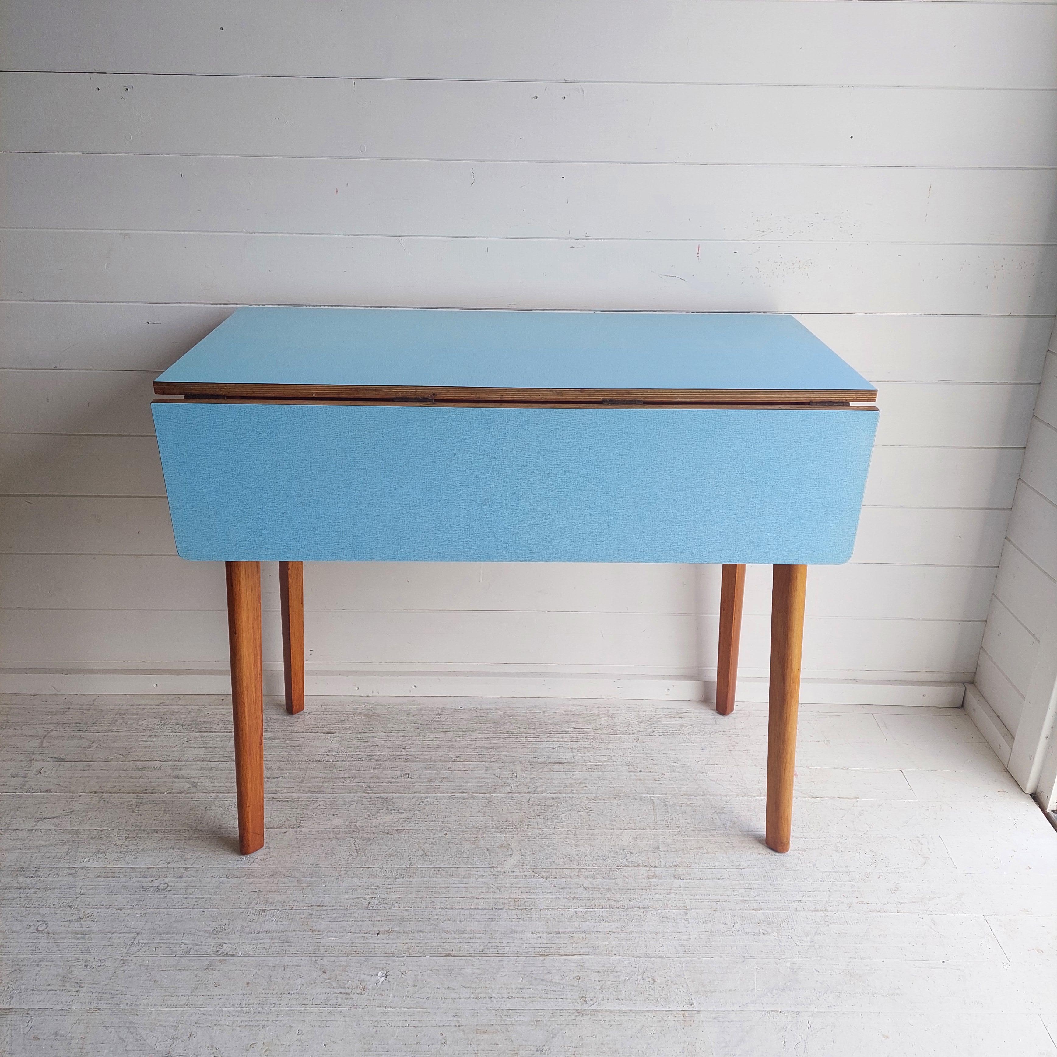 Mid Century Blue Formica Drop Leaf Kitchen Dining Table With Wooden Legs 60s In Good Condition For Sale In Leamington Spa, GB
