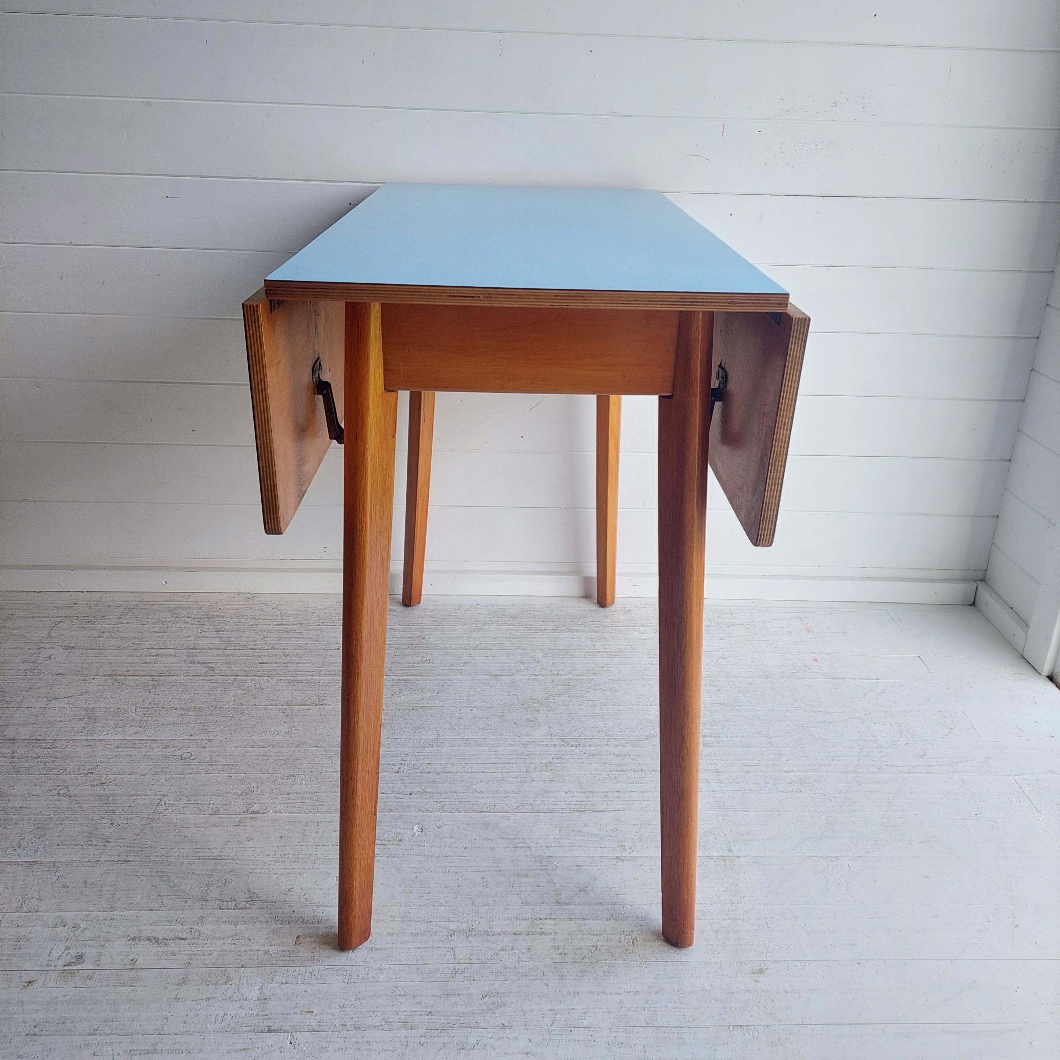 20th Century Mid Century Blue Formica Drop Leaf Kitchen Dining Table With Wooden Legs 60s For Sale