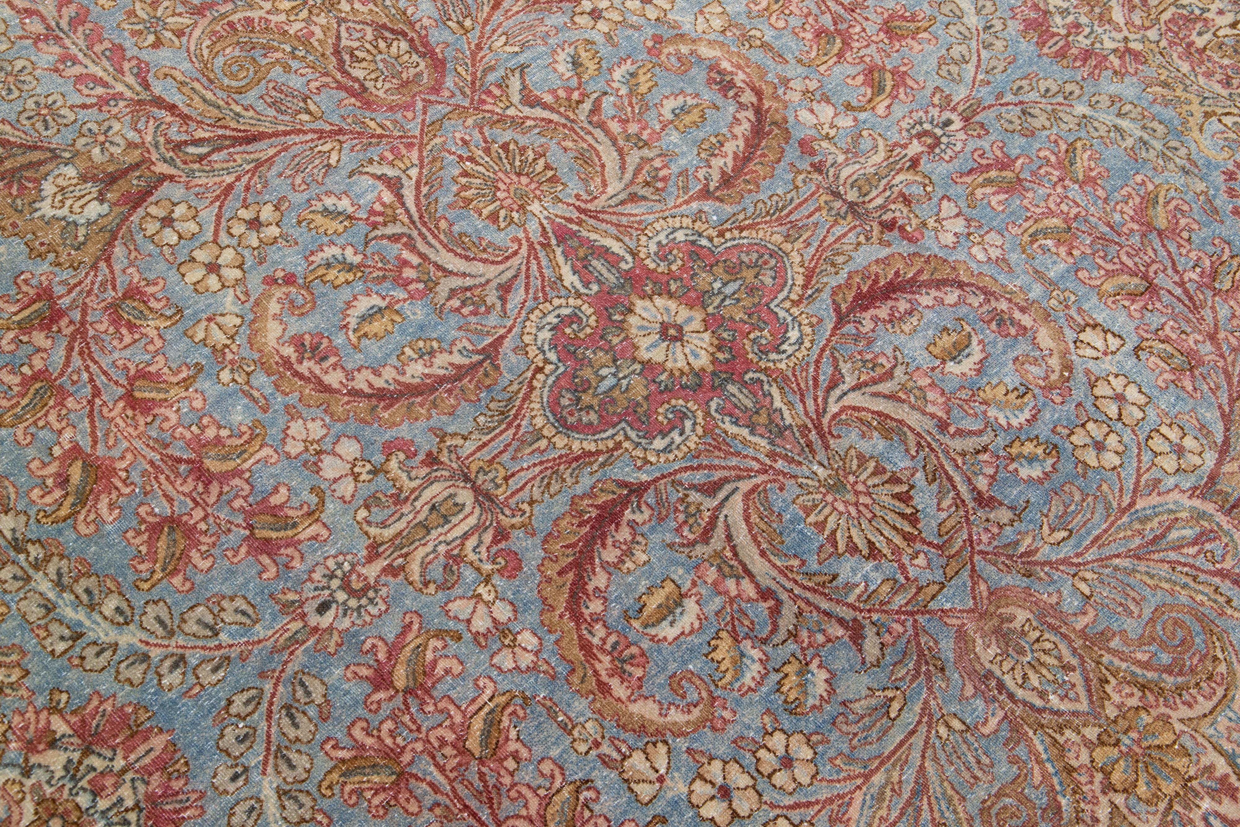 Malayer Mid Century Blue Handmade Persian Kirman Wool Rug With Allover Floral Motif For Sale