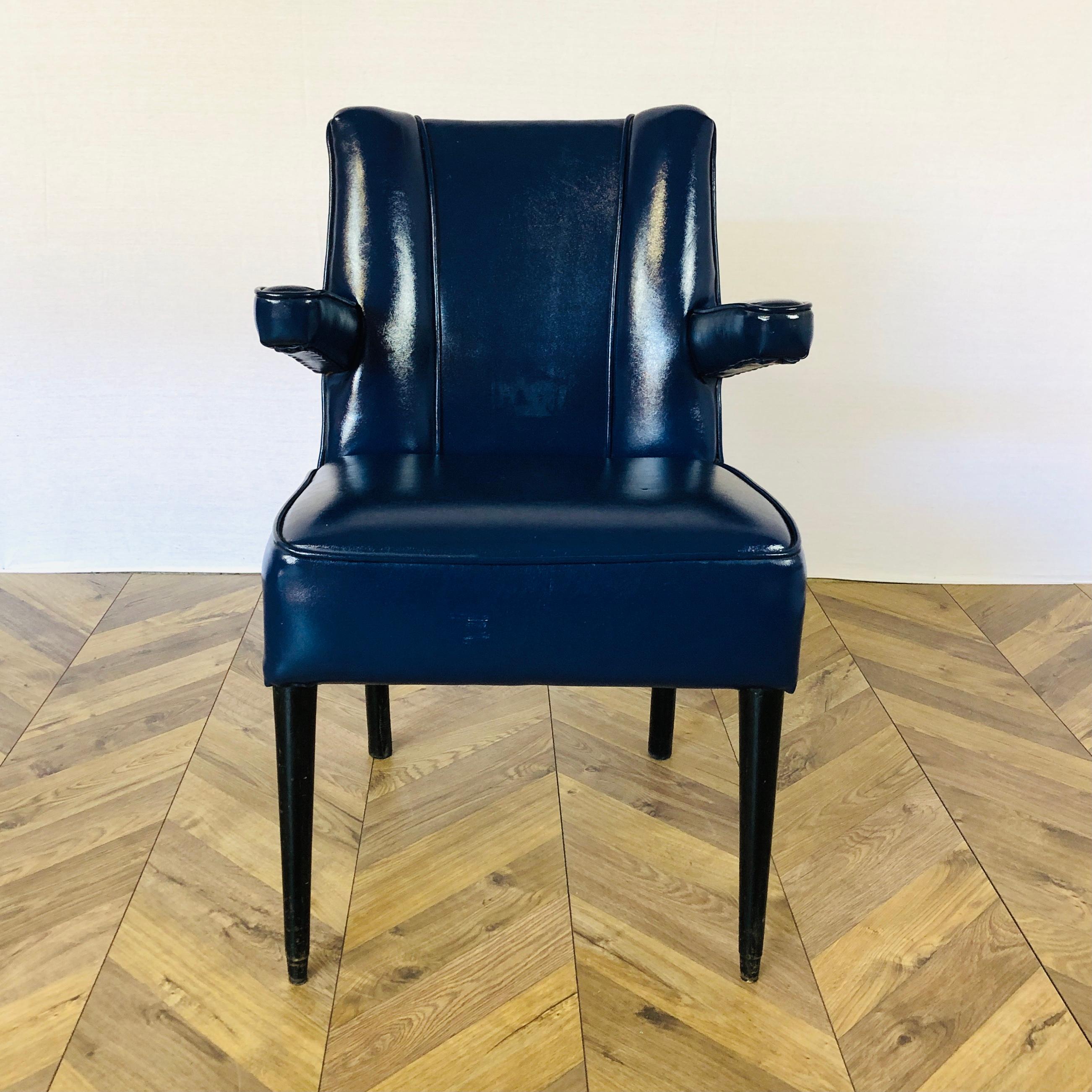 Beautifully designed, blue leather lounge chair / armchair, Circa 1970s.

The chair, which sits on black legs and is very comfortable, is in great condition, with no rips or tears to the leather.