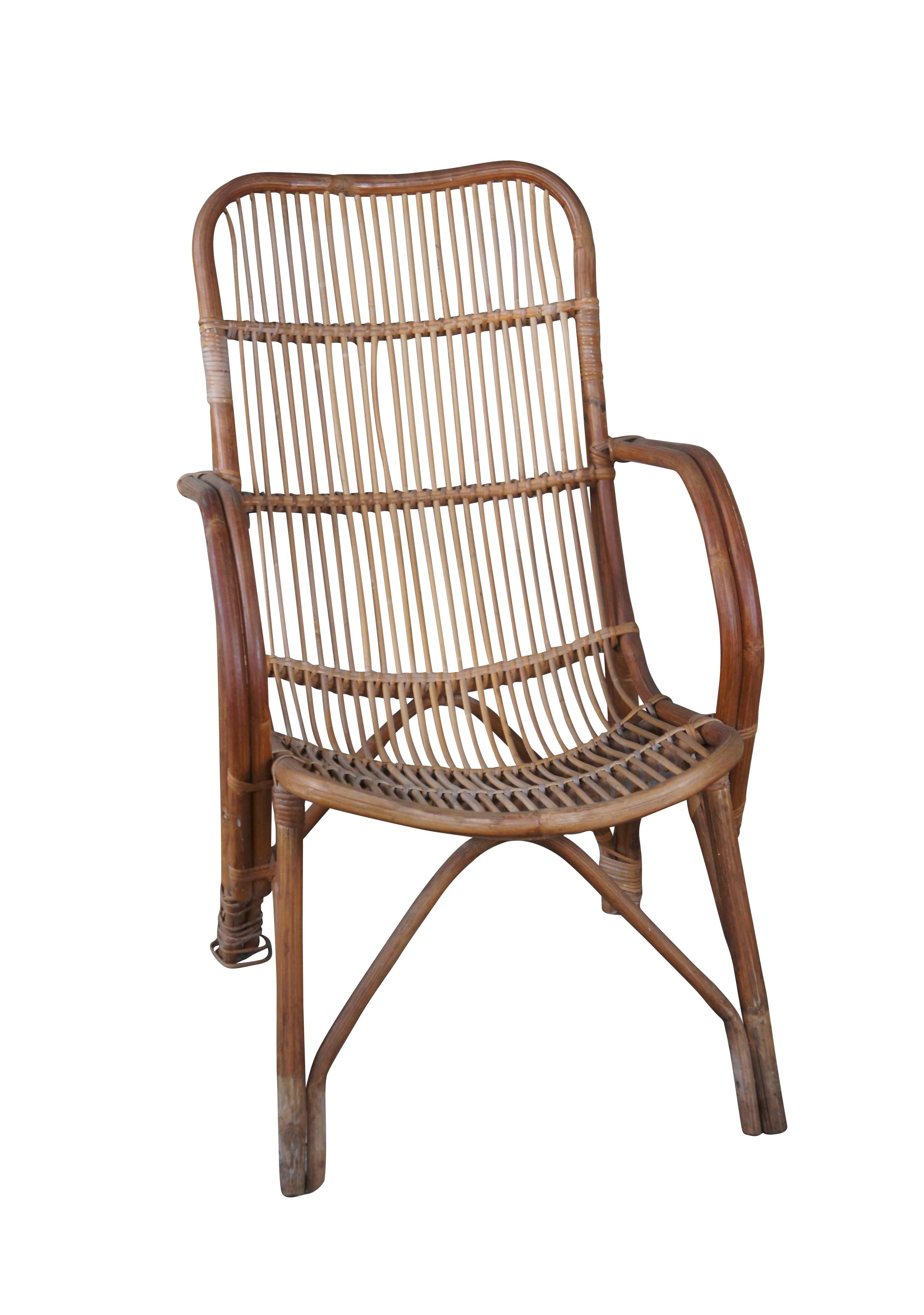 Bohemian bentwood armchair made from bamboo with rattan accents, circa 1970s. Its modern form with bring a pleasant feel to any space.