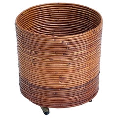 Vintage Midcentury Boho Modern Rattan Planter or Waste Basket on Casters