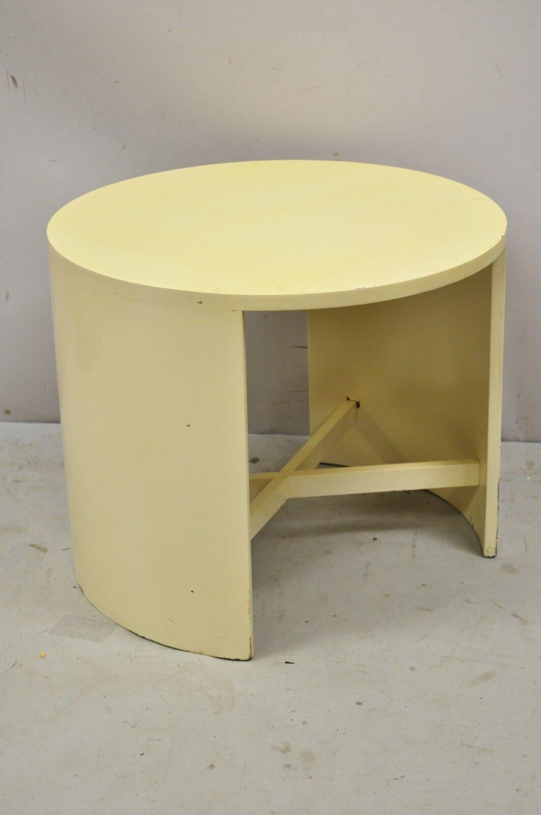 Midcentury bone lacquer round post modernist stretcher base accent side table. Item features Round top, cross stretcher base, beige lacquer finish. circa 1970. Measurements: 18