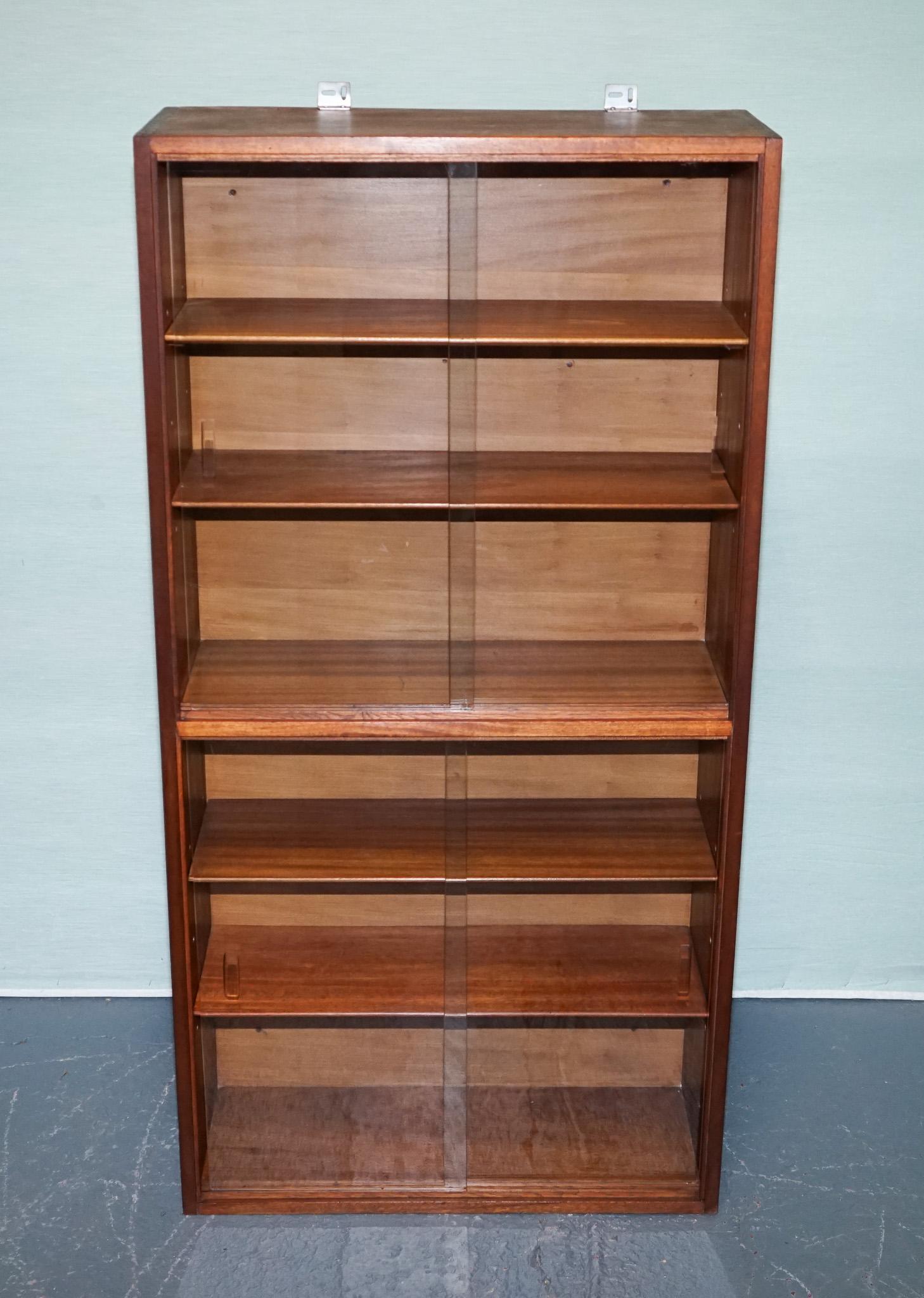 British MID CENTURY BOOKCASE DISPLAY CABINET WITH GLASS SLiDING DOORS For Sale