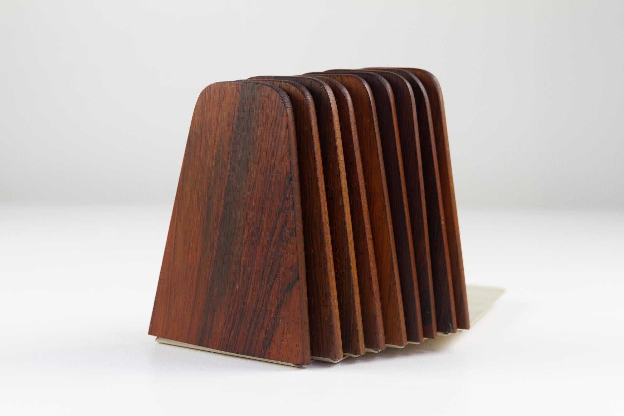 Mid-century bookends by Kai Kristiansen for FM 1960s, set of 9.
Very decorative Danish modern bookends in rosewood and metal designed by Danish designer Kai Kristiansen for Feldballes Møbelfabrik. Made as a supplement to FM Reolen wall unit