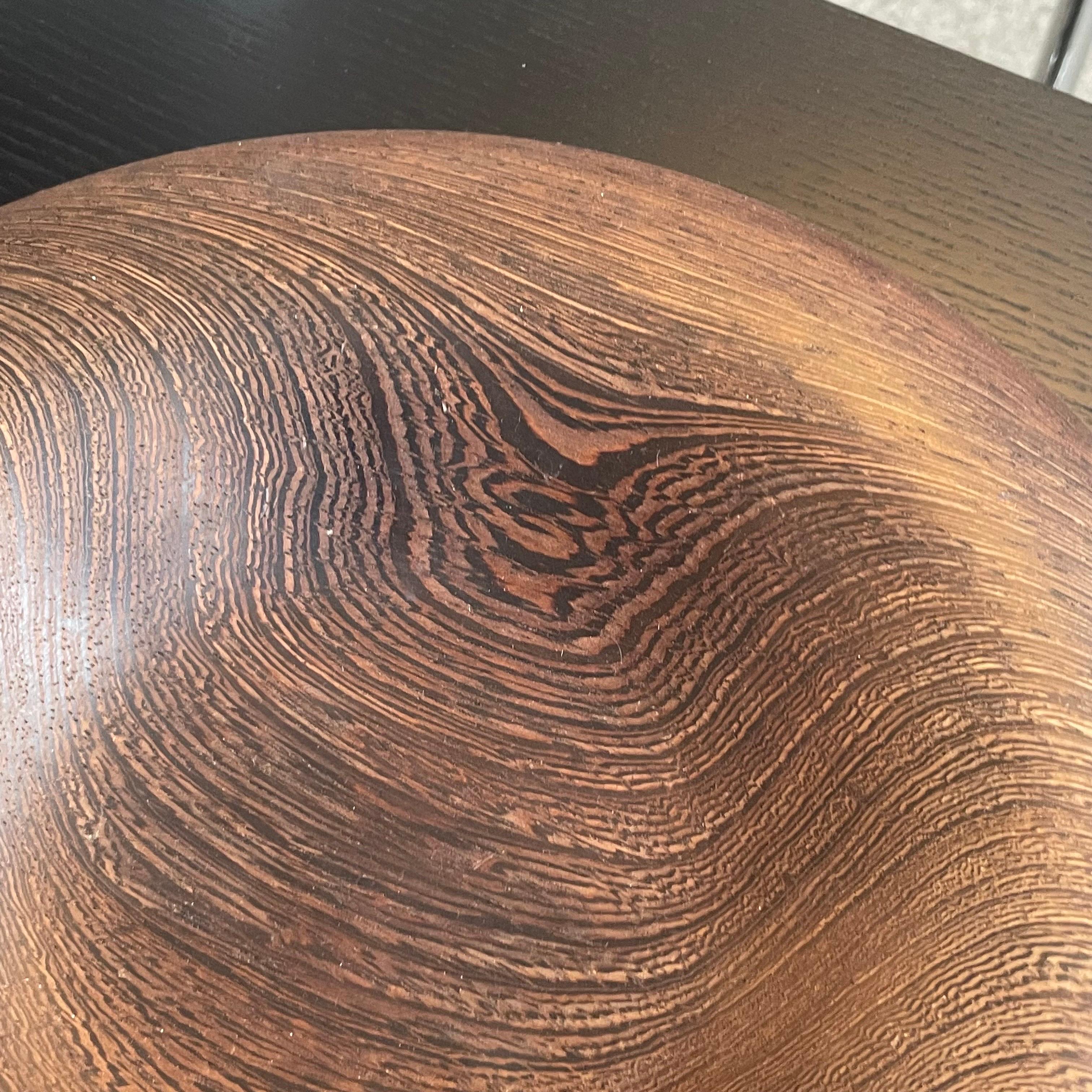 Mid Century Bowl in Solid Wengé, 1960s.

Beautiful turned decorative bowl in solid wengé. Wonderful organic shape and a very distinct wood grain - quintessentially wengé. A great decorative piece on your desk, table or sideboard. Good size and