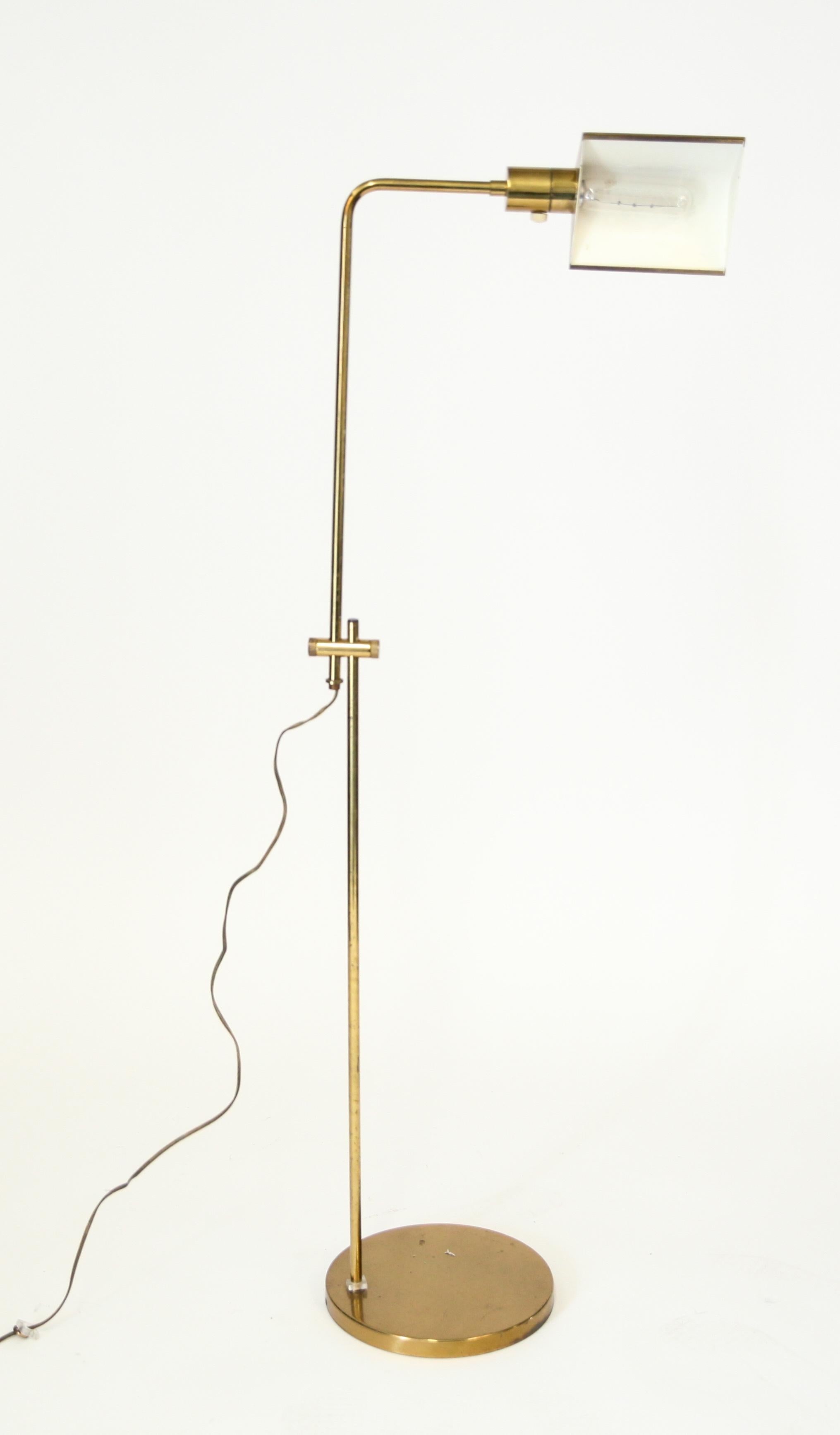 Mid-century brass adjustable floor lamp. Size: 50