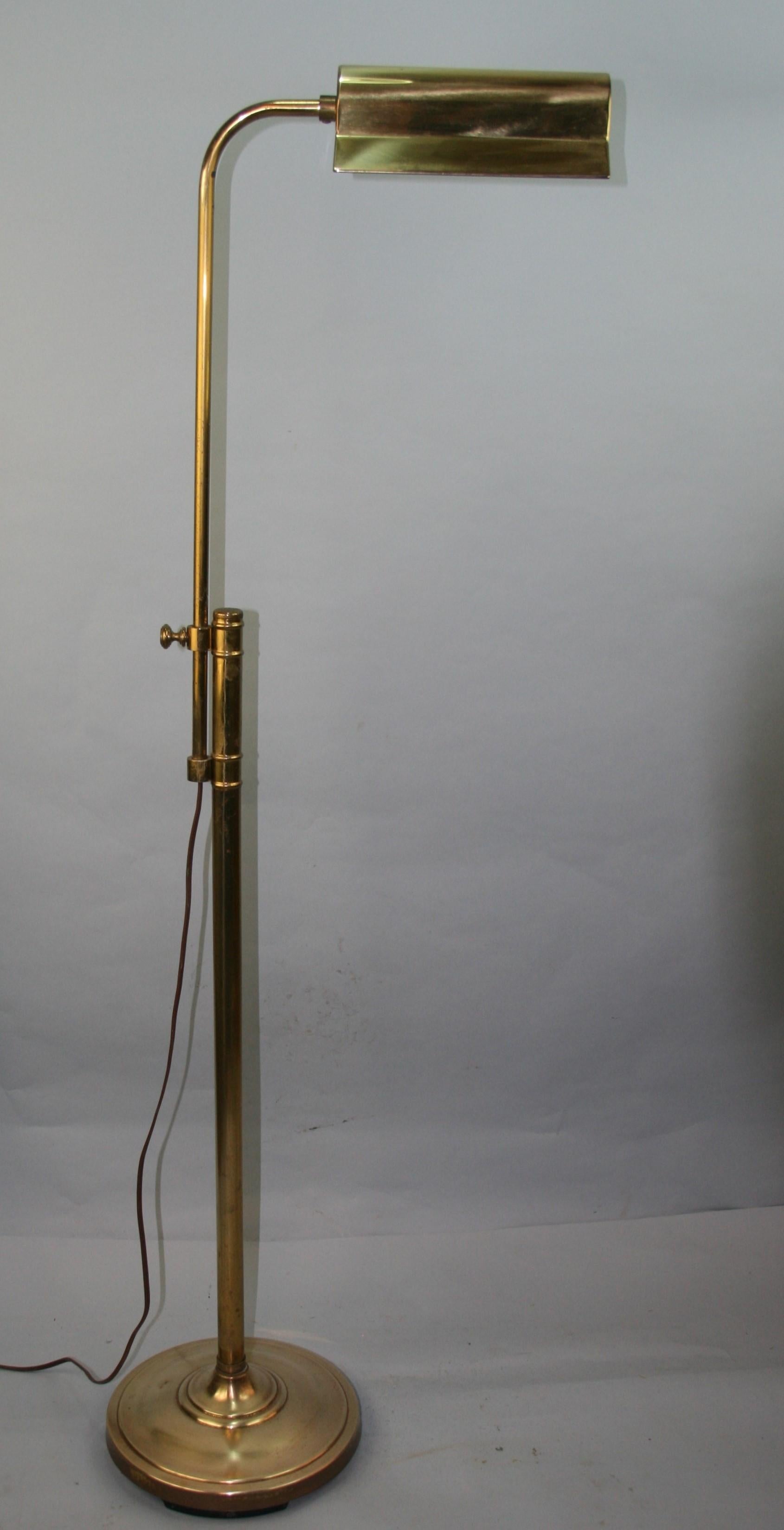 Solid brass adjustable brass floor lamp.