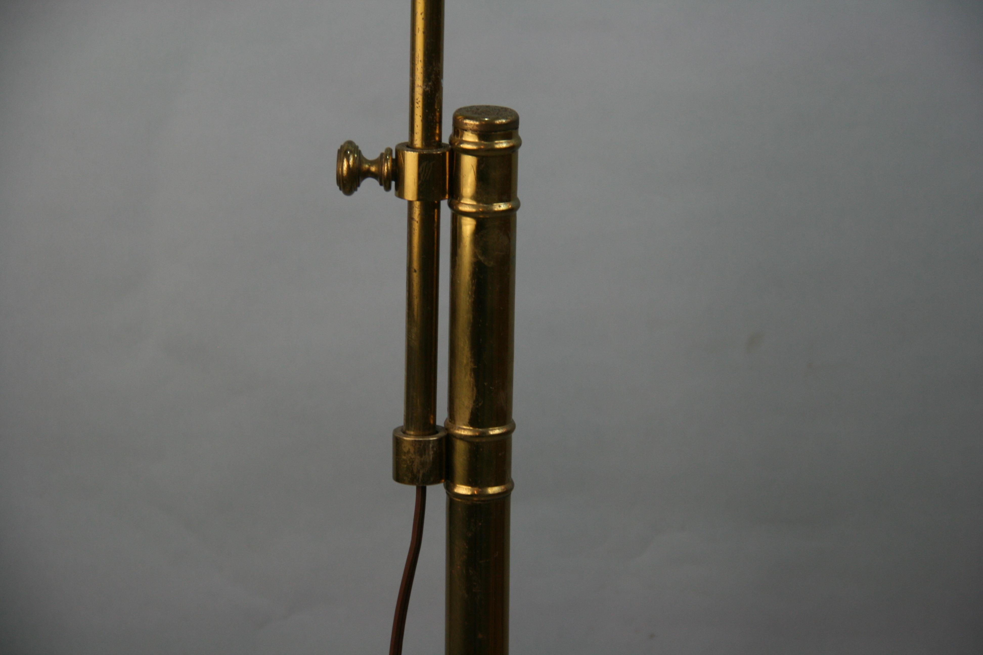 Mid Century Brass Adjustable Floor Lamp In Good Condition For Sale In Douglas Manor, NY