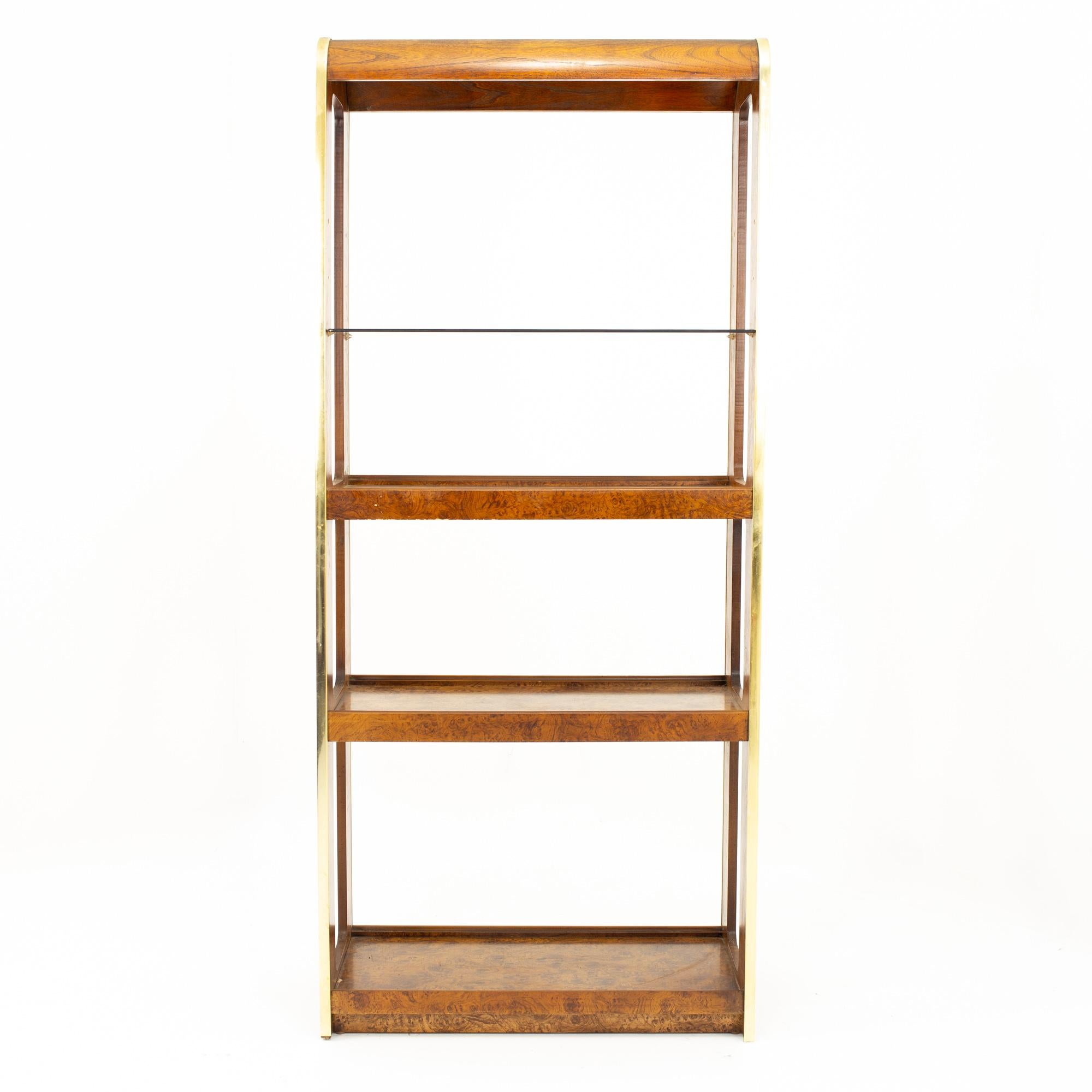 Mid Century Brass and Burlwood Etagere Bookshelves

Bookshelf measures: 32 wide x 16.5 deep x 72.5 high

This set is available in what we call Restored Vintage Condition. Upon purchase it is thoroughly cleaned and minor repairs are made - all of