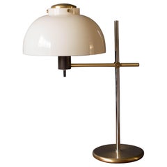 Mid Century Brass and Chrome Adjustable Swing Arm Lamp by Lightolier