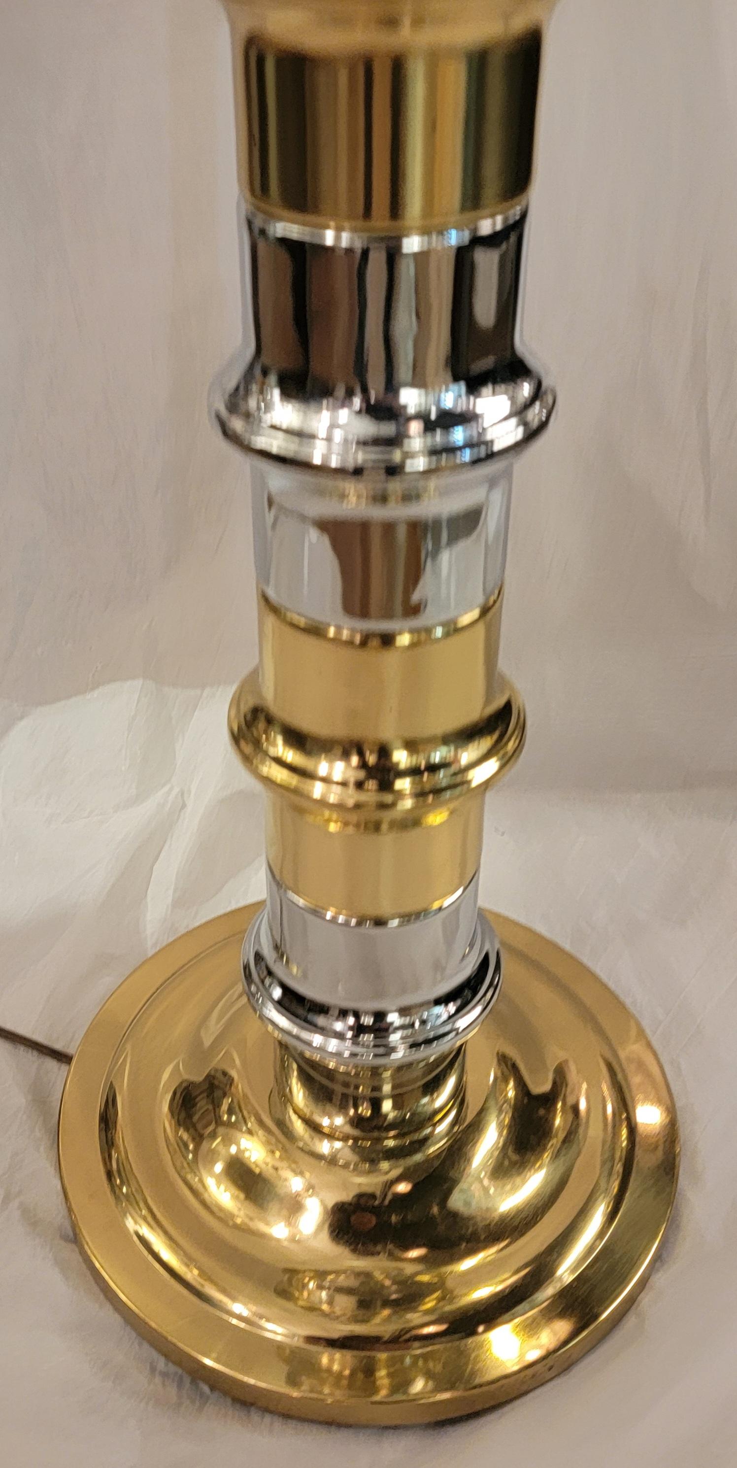 Mid Century Brass and Chrome table lamp. Sections are - 54 high x 18.25diameter

