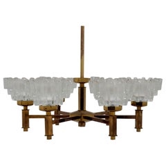 Mid-Century Brass and Cut Glass 6-Arm Chandelier by Hans-Agne Jakobsson, 1960s.