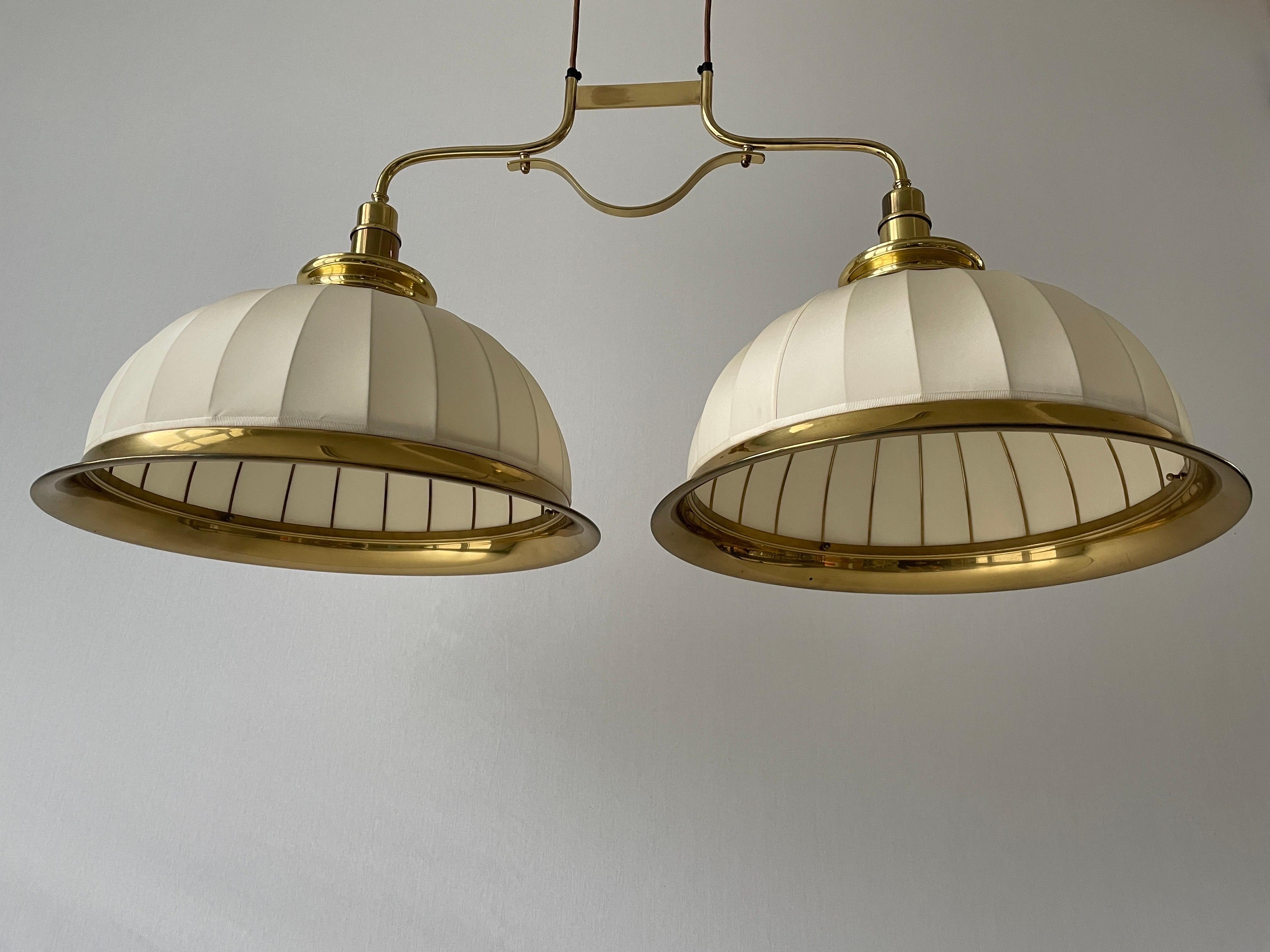 Mid-century Modern Brass body and Fabric Shade Twin-shade Billiard Ceiling Lamp by WKR, 1960s, Germany

Adjustable large lampshades.

Brass body & fabric shade
Manufactured in Germany

This lamp works with 2x E27 light bulbs.

Measures: 
Height: 165