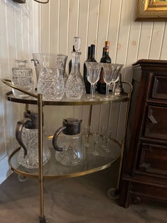Mid-Century brass and glass oval bar cart