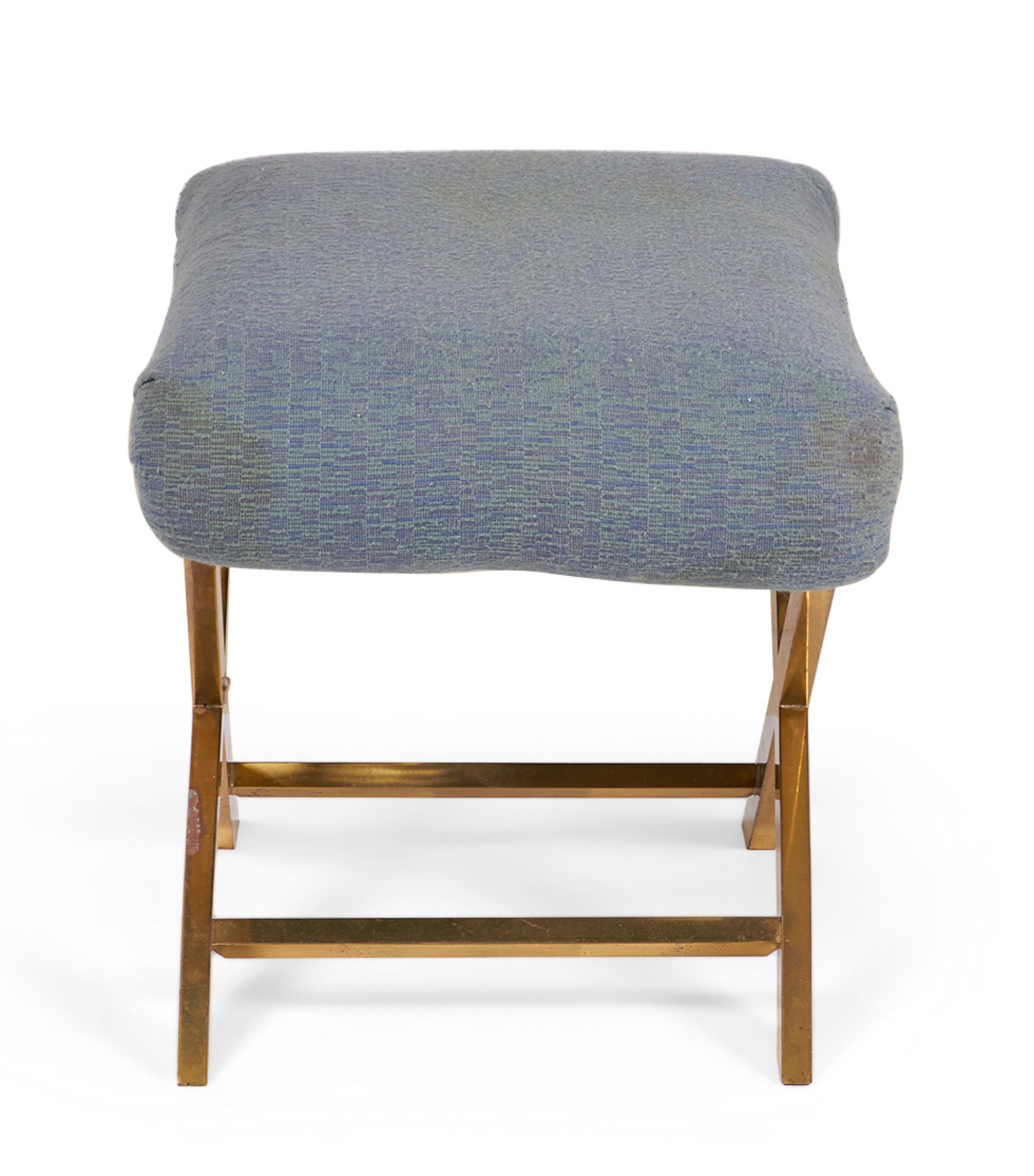 Mid-Century x-bench with a brass frame topped with a gray-blue cotton upholstered seat. (Same benches with different upholstery: DUF0056-DUF0059)
