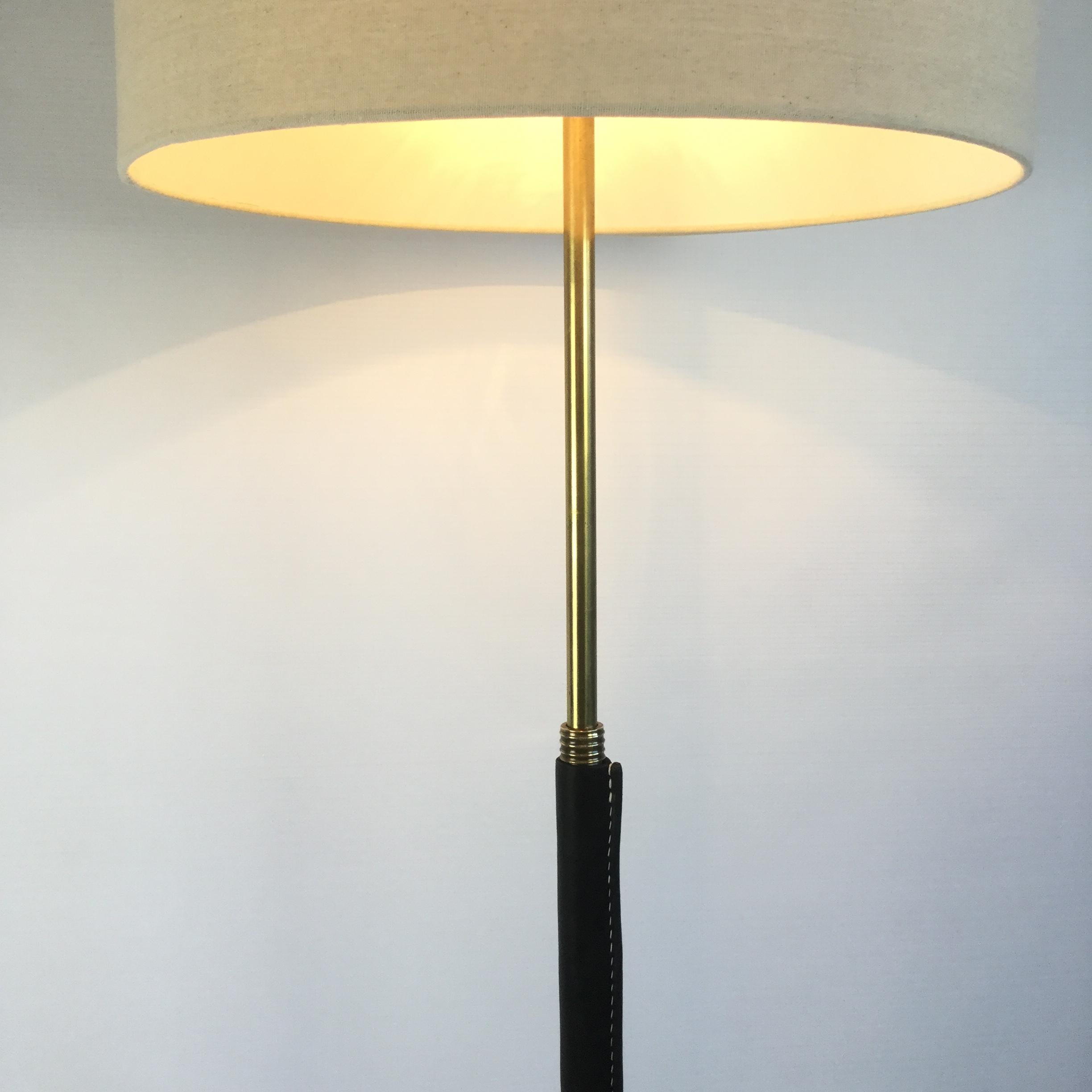 Mid-20th Century Black Leather and Brass Floor Lamp in a Manner of Jacques Adnet, France, 1950s