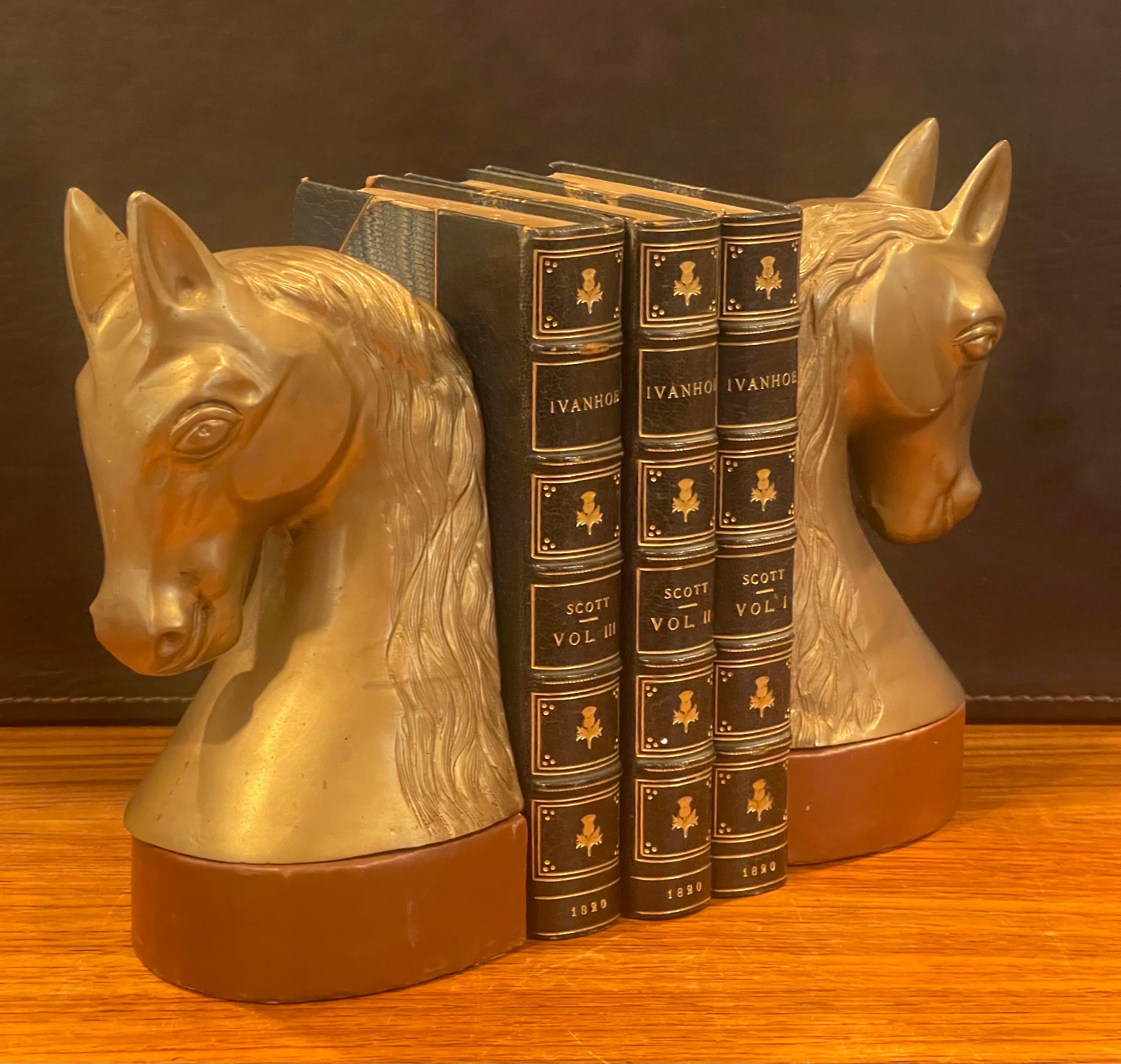 Cast Mid-Century Brass and Leather Horse Head Bookends For Sale