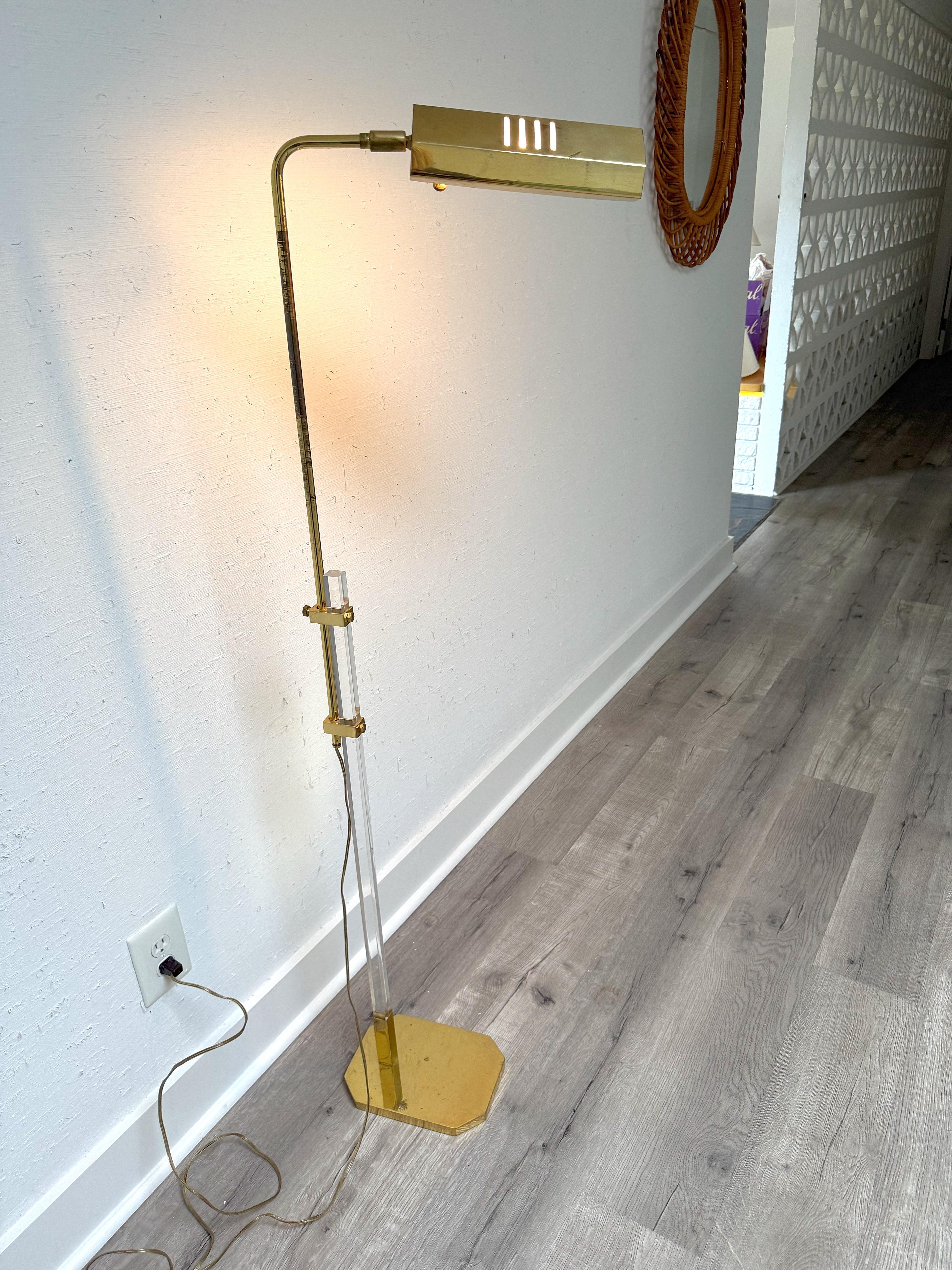 An adjustable floor lamp with a swivel shade by Bauer Lamp Co. The height is adjustable with a large brass set screw.


At is lowest it measures: 37.25” tall x 20.5” deep x 7.25”
At its highest it measures: 56.75” tall