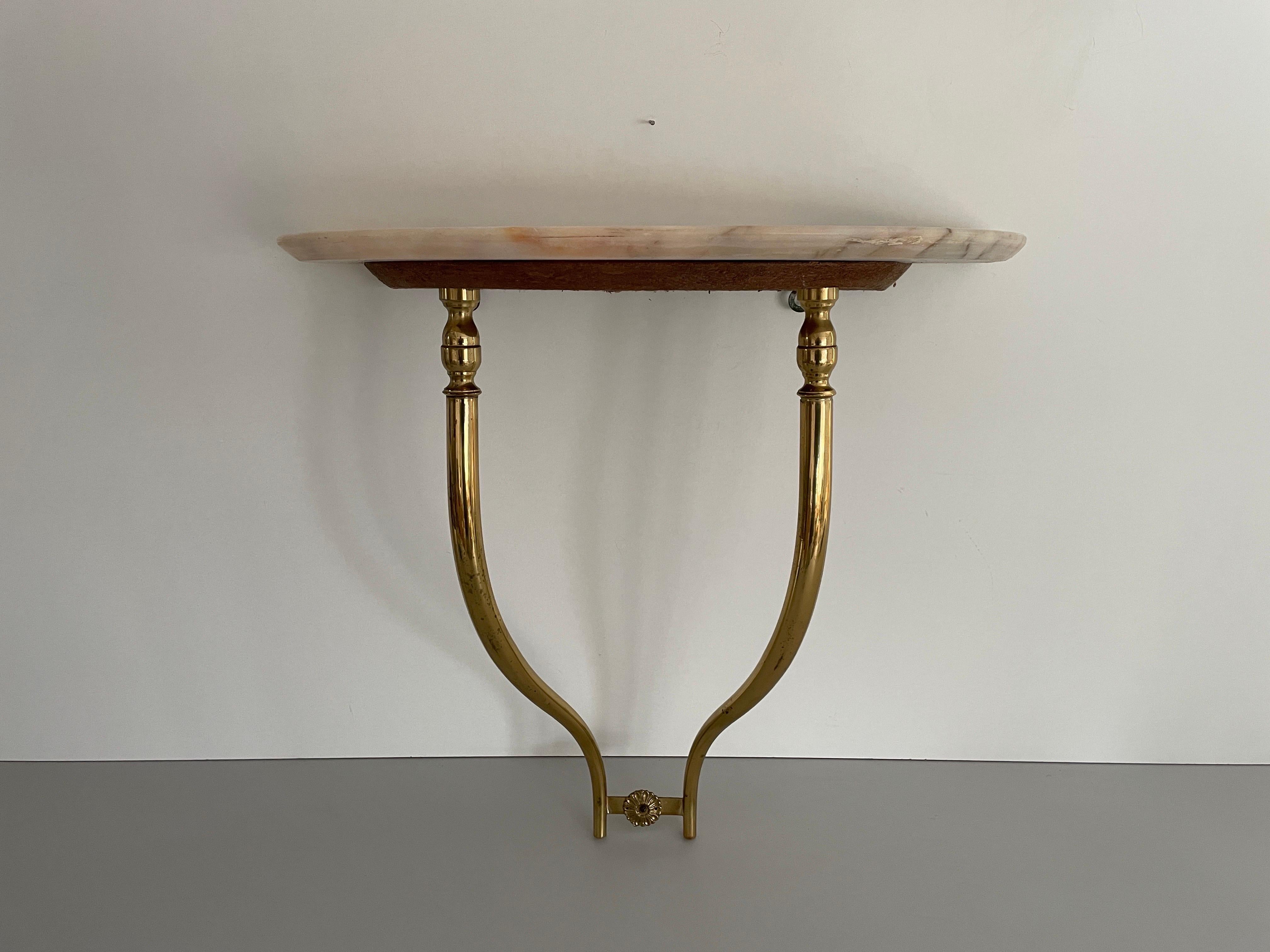 Mid-Century Brass and Marble Top Floating Wall Console Table, 1950s, Italy

No damage, no crack.
Wear consistent with age and use.

Measurements: 
Height: 48 cm
Width: 50 cm
Depth: 24 cm
