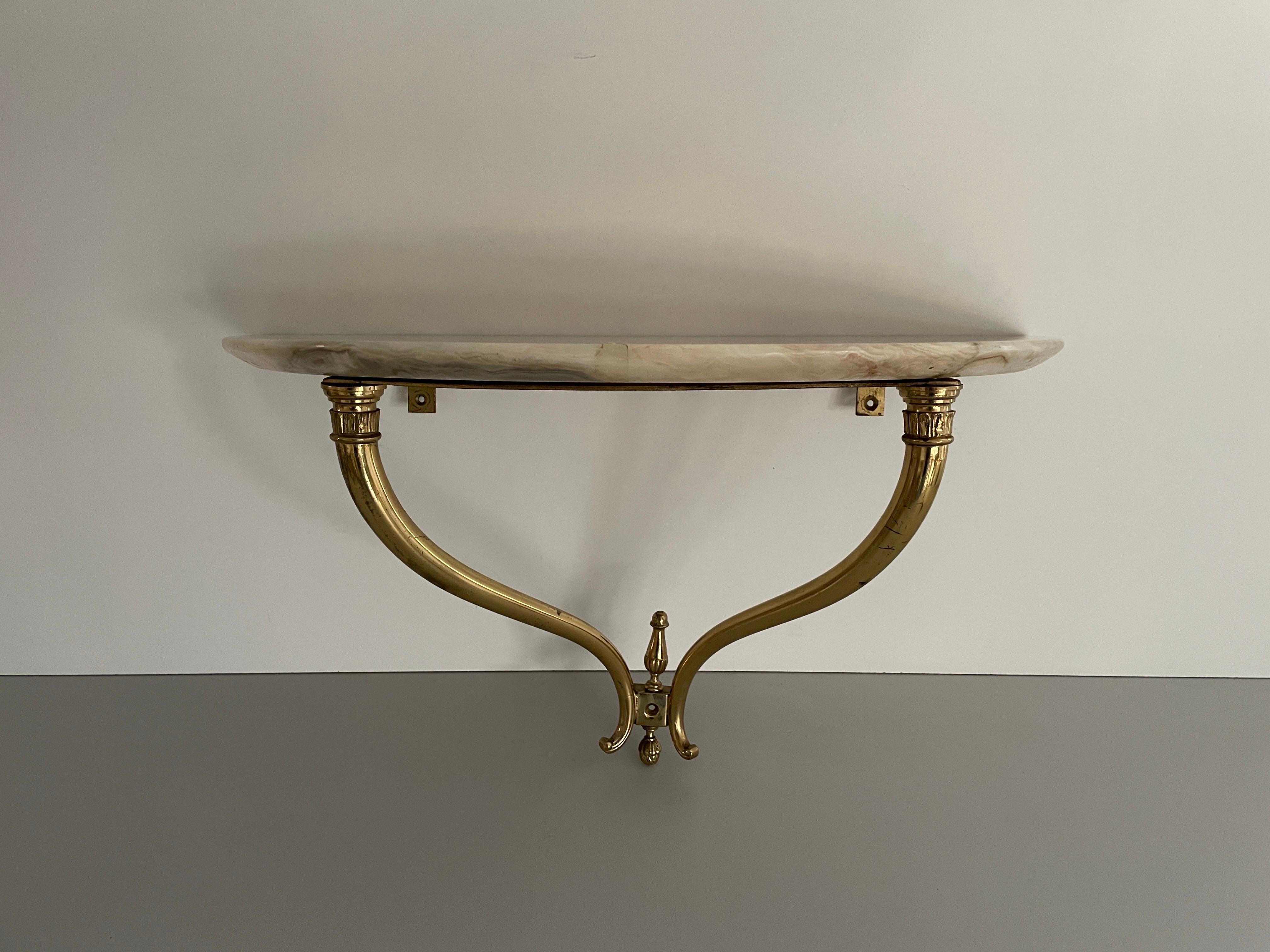 Mid-Century Brass and Marble Top Floating Wall Console Table, 1950s, Ita

No damage, no crack.
Wear consistent with age and use.

Measurements: 
Height: 32 cm
Width: 54 cm
Depth: 25 cm