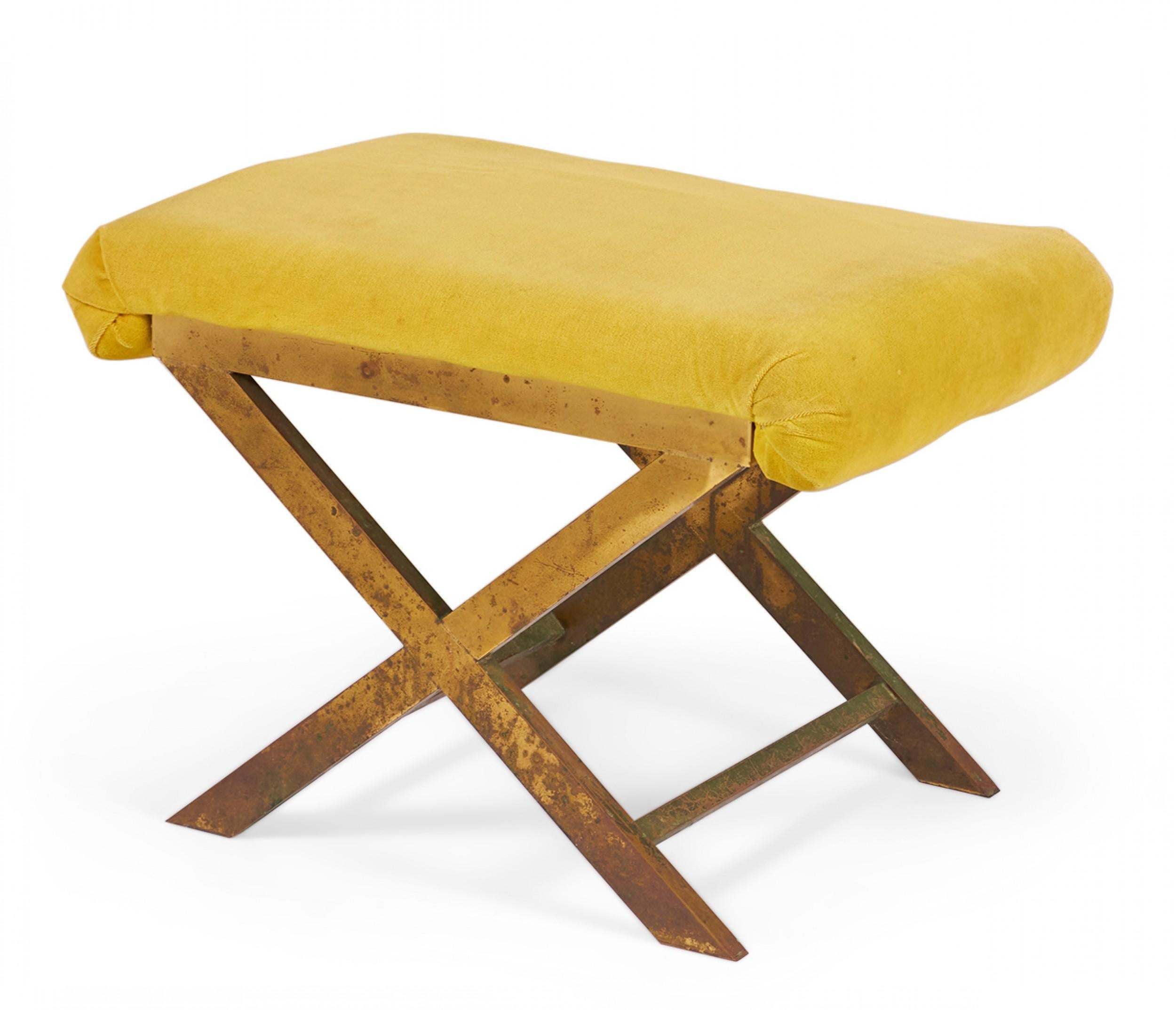 Mid-Century x-bench with a brass frame topped with a saffron yellow velour upholstered seat. (Same benches with different upholstery: DUF0056-DUF0060)
