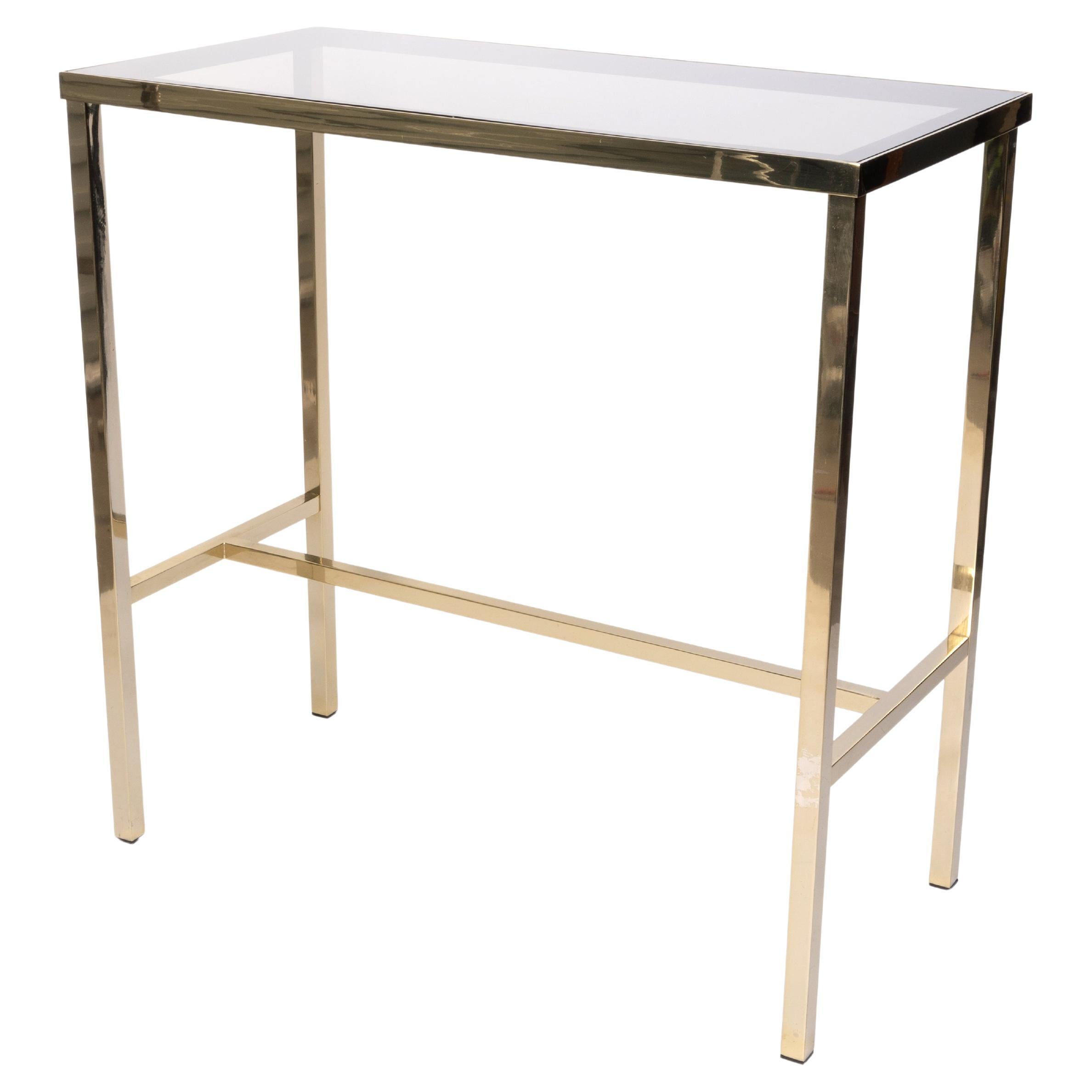 Mid Century Lacquered Brass And Smoked Glass Inset Small Console Table, C.1970, France

Neatly proportioned. In very good condition commensurate with age. Two very small screw holes to the reverse of table (please refer to photos)  Flea bit to side