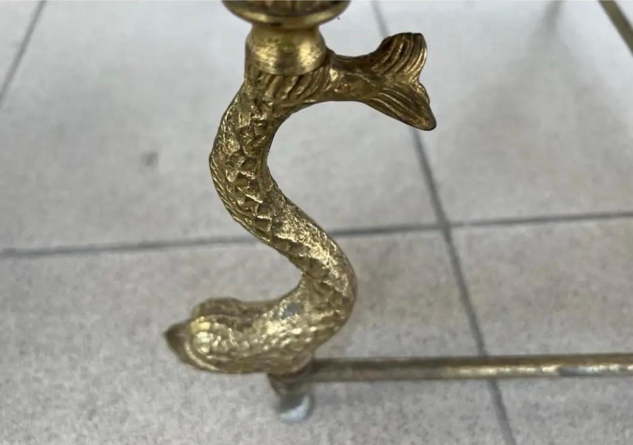 Hollywood Regency Mid Century Brass and Stone Top Nesting Tables with Brass Dolphins Two Pieces For Sale