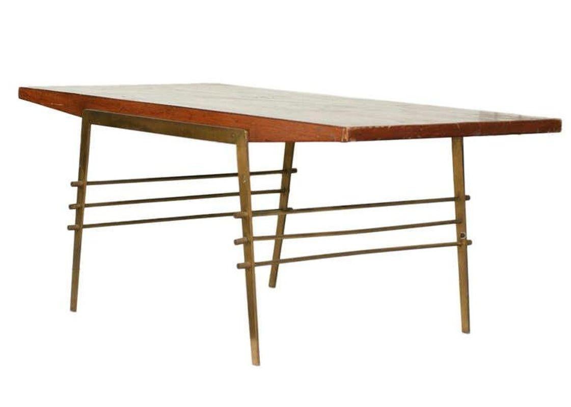 Mid-century wood coffee table with brass architectural base.