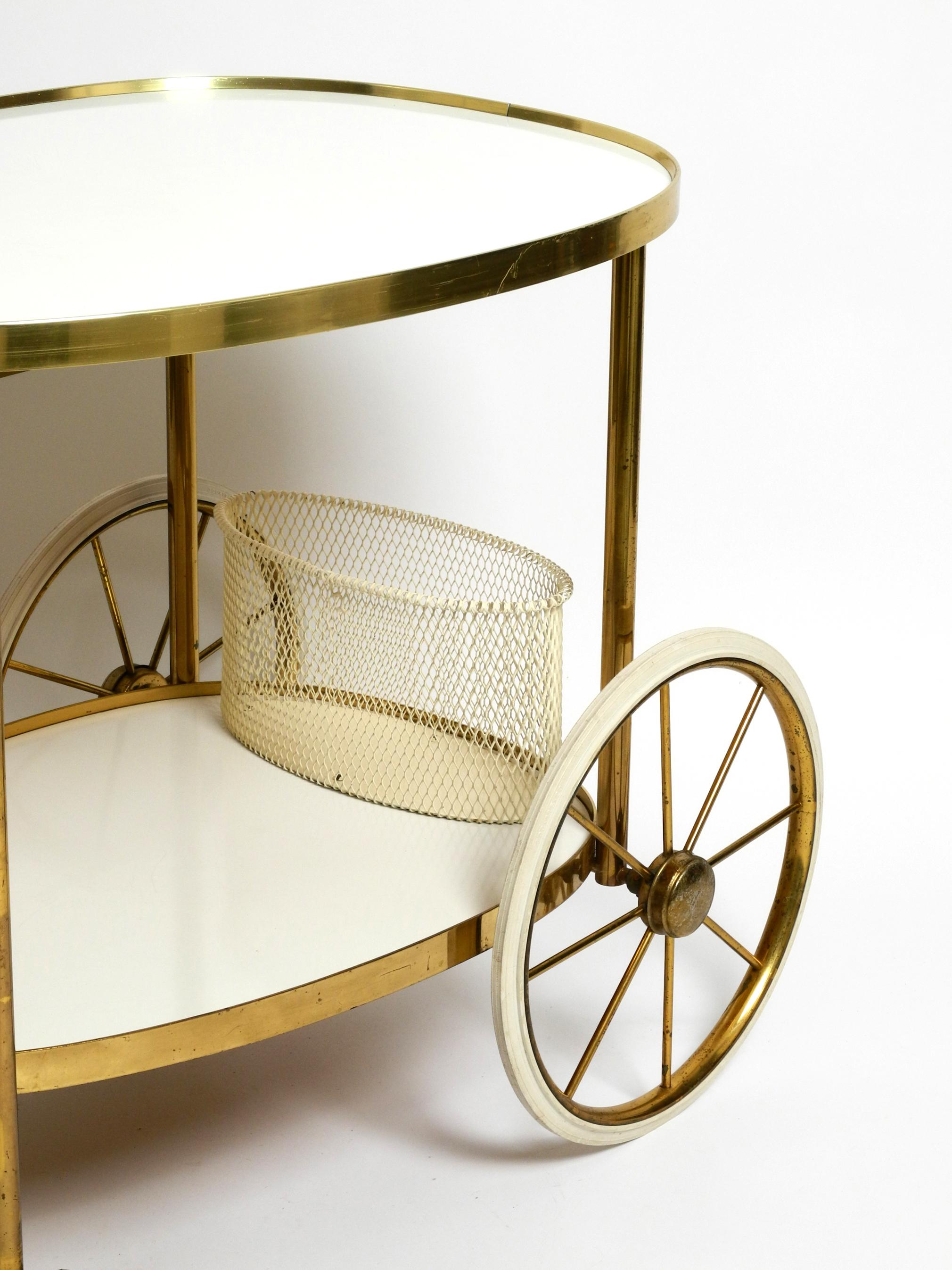 Mid Century brass and wood serving trolley or bar cart by Vereinigte Werkstätten For Sale 9