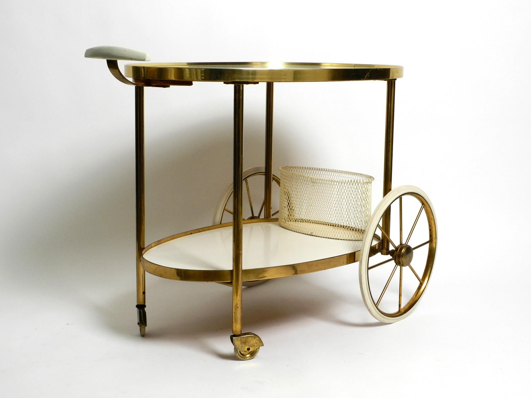 Mid Century brass and wood serving trolley or bar cart by Vereinigte Werkstätten For Sale 12