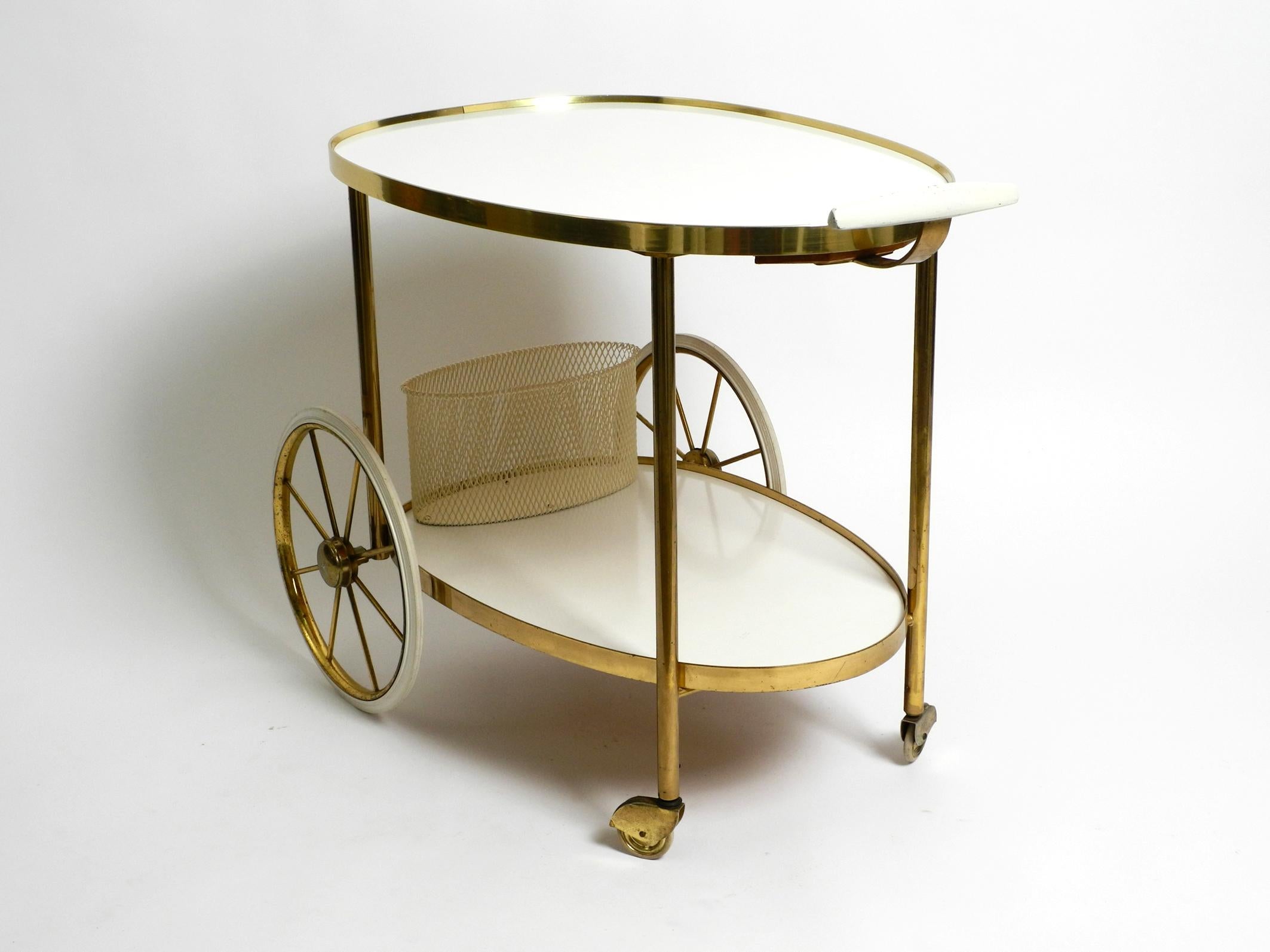 Mid Century brass and wood serving trolley or bar cart by Vereinigte Werkstätten For Sale 13