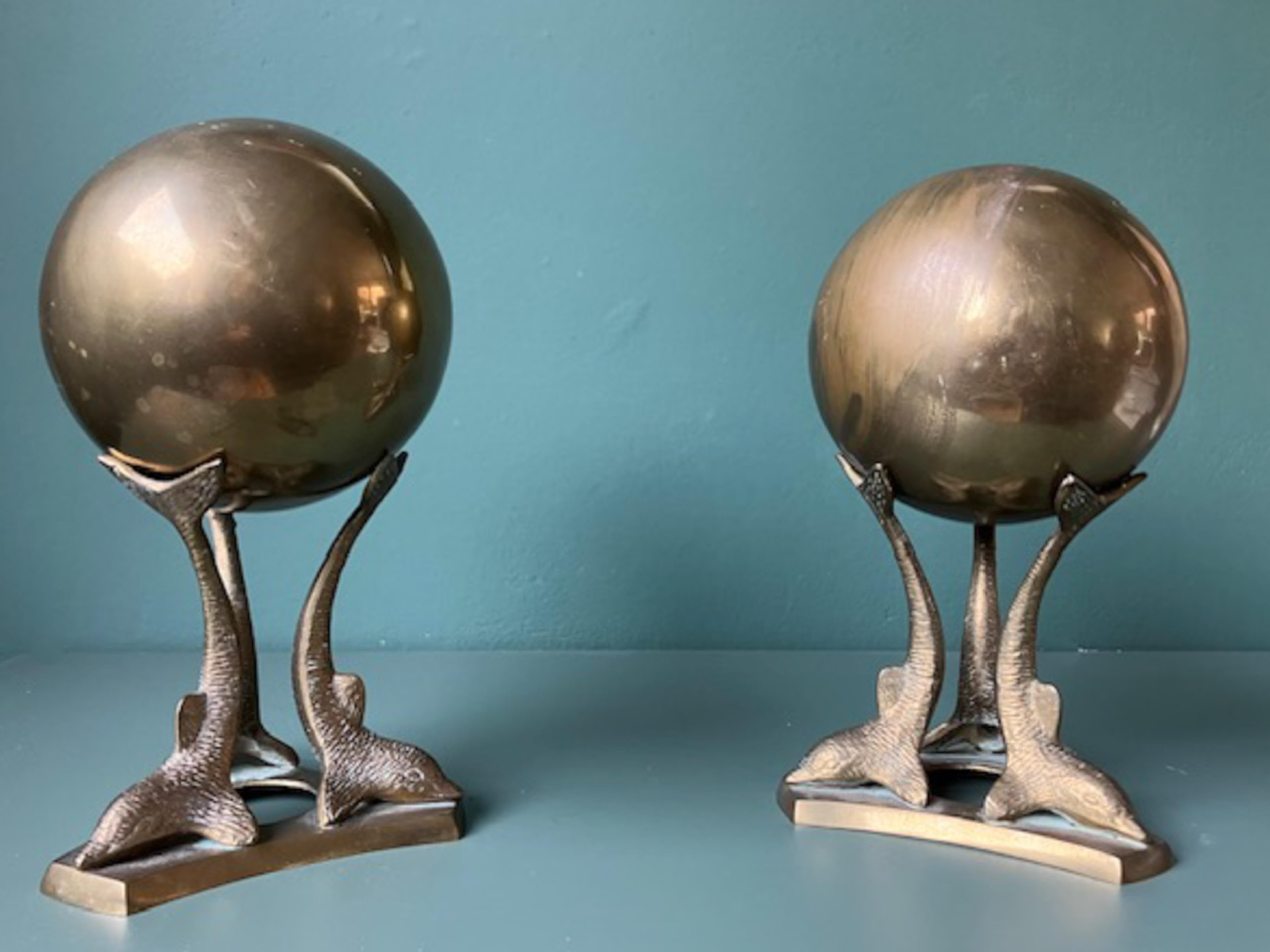 Mid-Century Modern Mid Century Brass Bookends Dolphins with ball, France 1950s For Sale