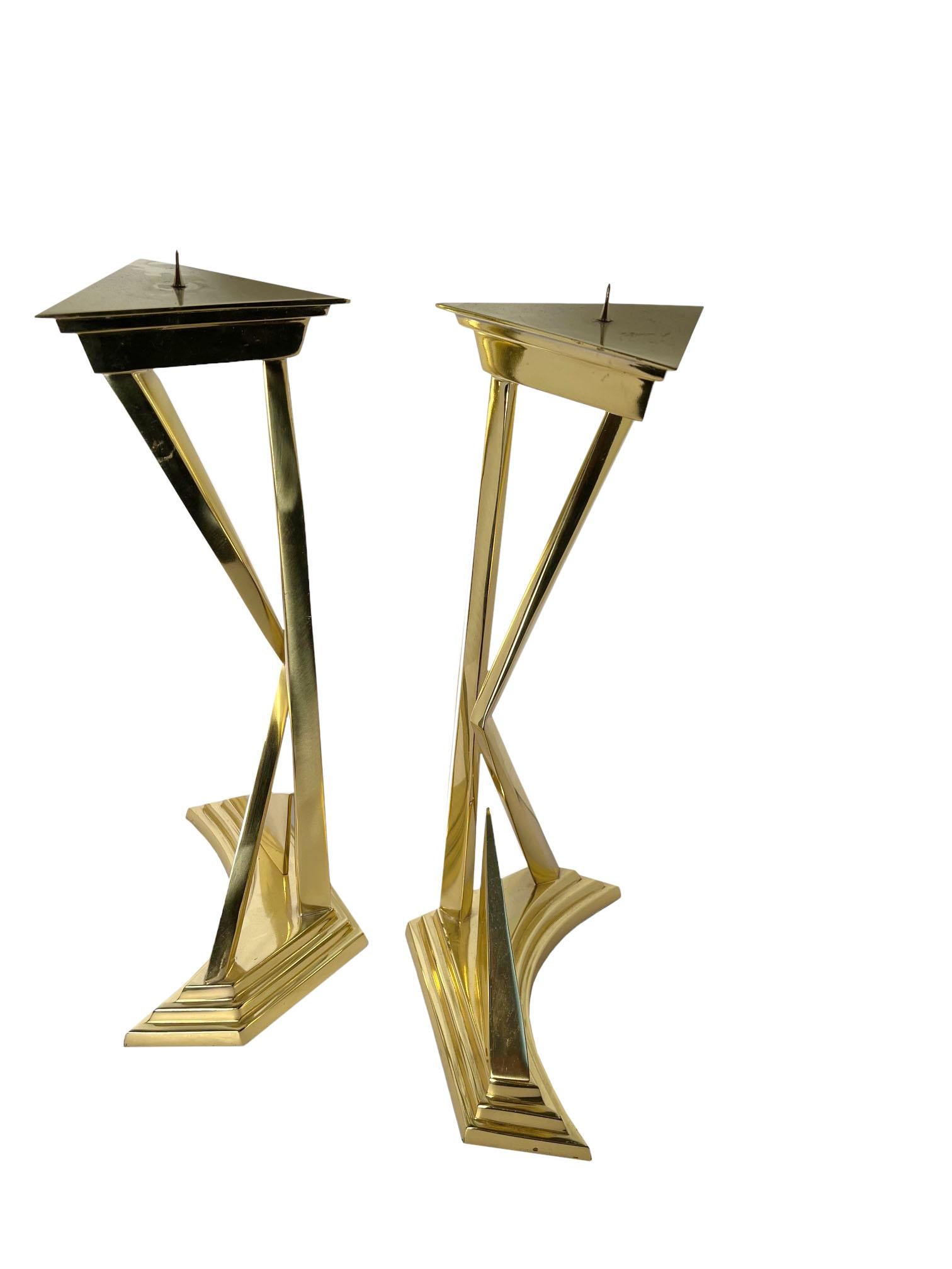 Salvador Dali style brass candlesticks, a pair. These magnificent candlesticks blend artistry and elegance, illuminating your space with a touch of whimsical wonder. 