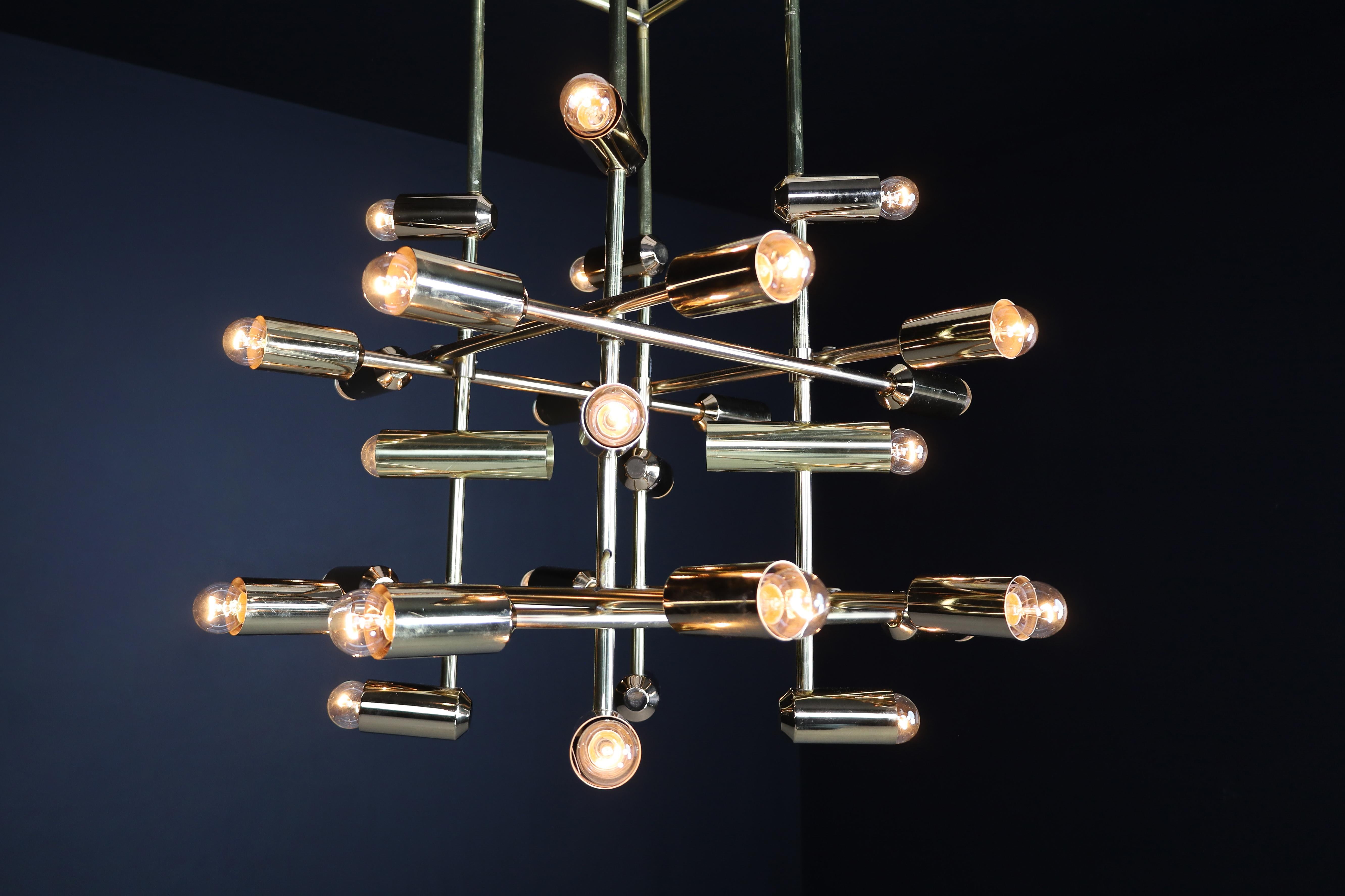 Mid-Century Modern Mid-Century Brass Chandelier wit 28 lights, Switzerland 1960s.   For Sale