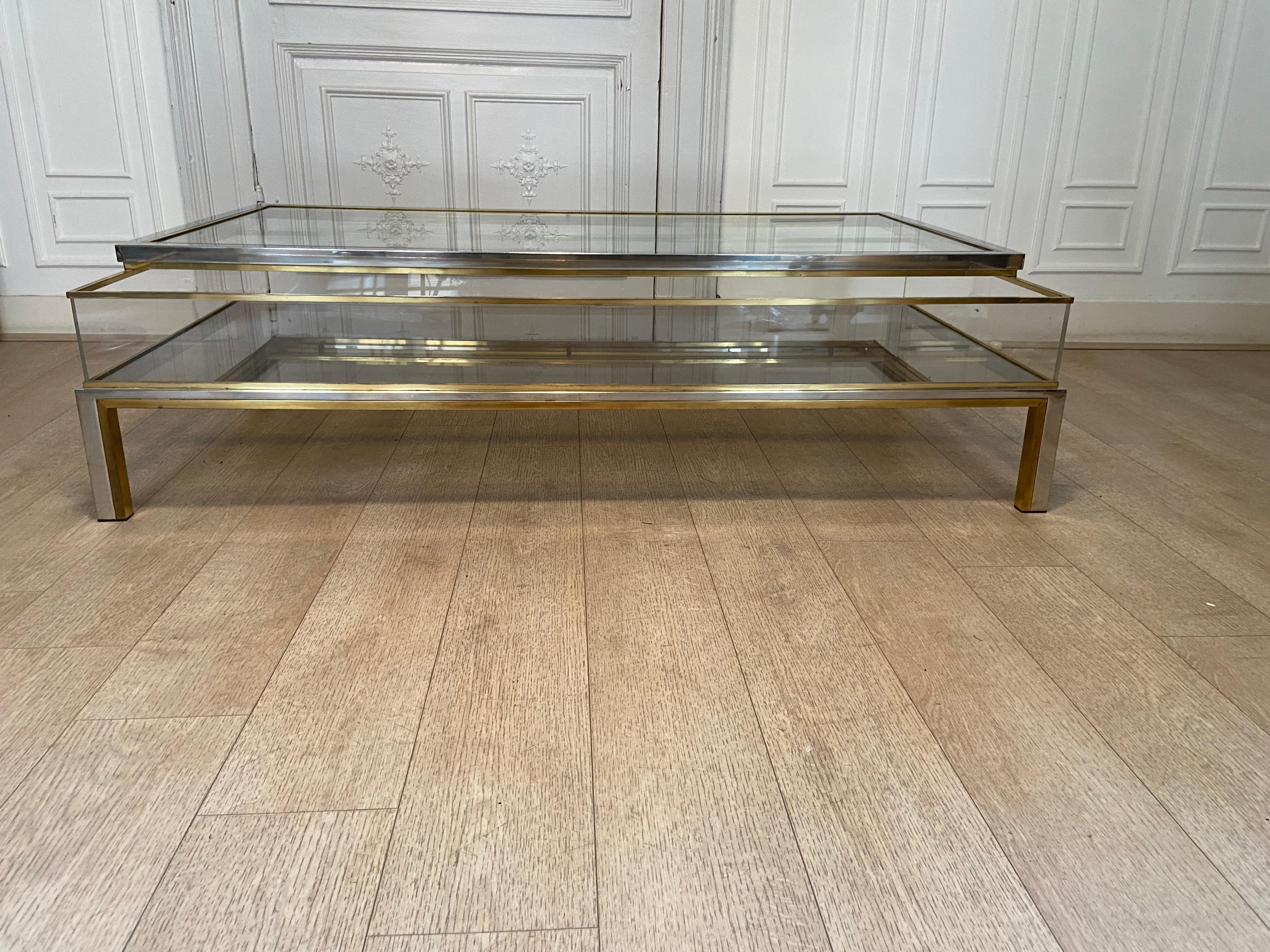 Midcentury brass, chrome, and glass showcase coffee table.