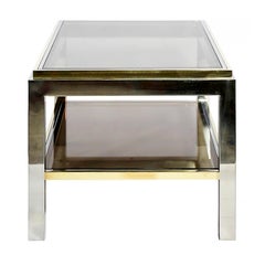 Tavolino in ottone, cromo e vetro di metà secolo firmato Jean Charles