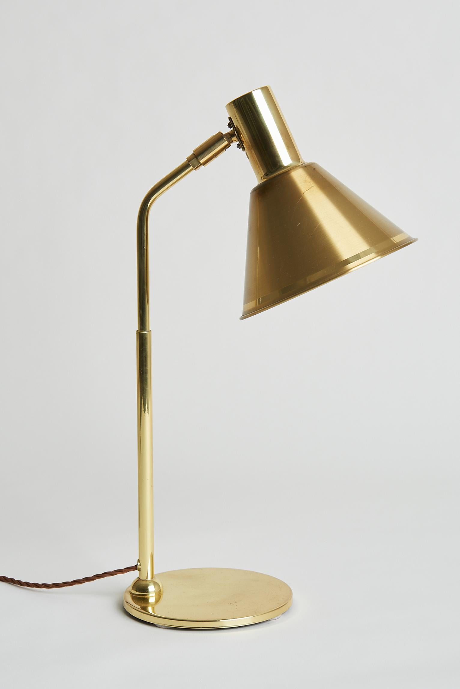 A brass adjustable desk lamp.
Sweden, third quarter of the 20th century.