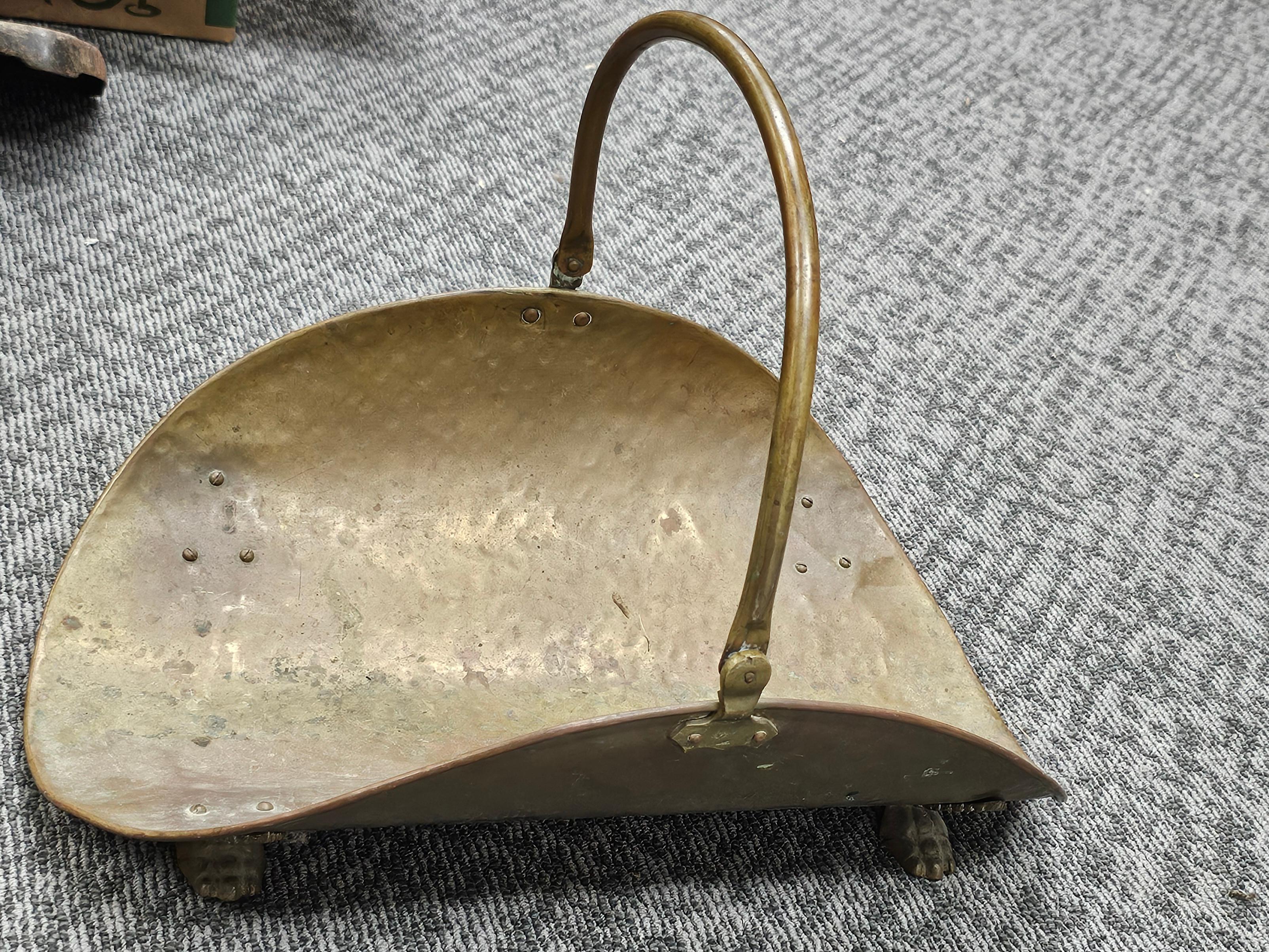 Mid Century Brass Fireplace Log Holder with Paw Feet.  Measures 20.5