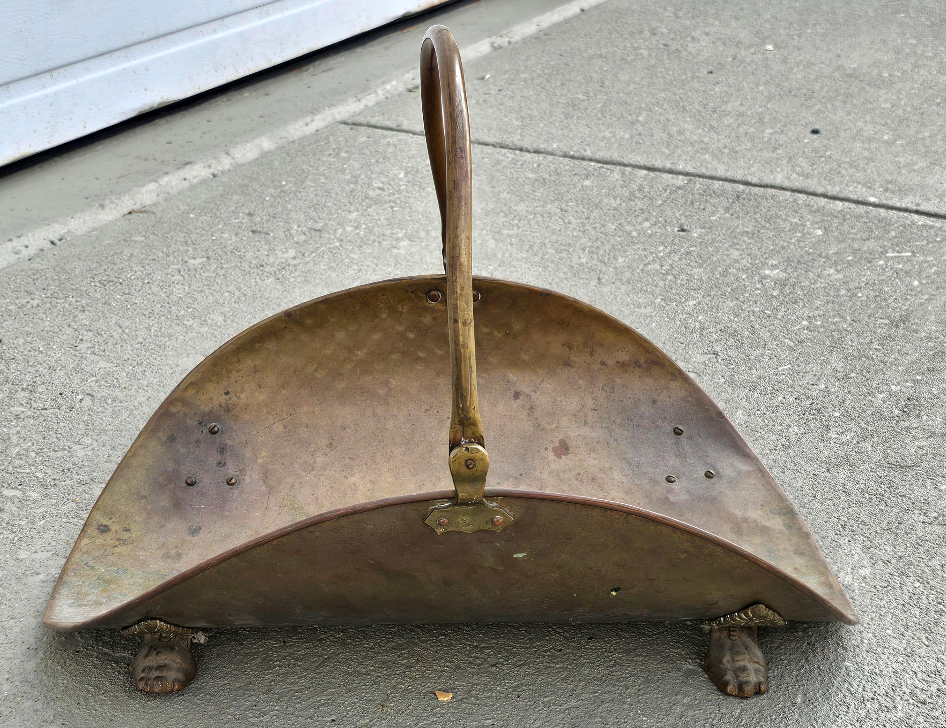 Patinated Mid Century Brass Fireplace Log Holder with Paw Feet For Sale