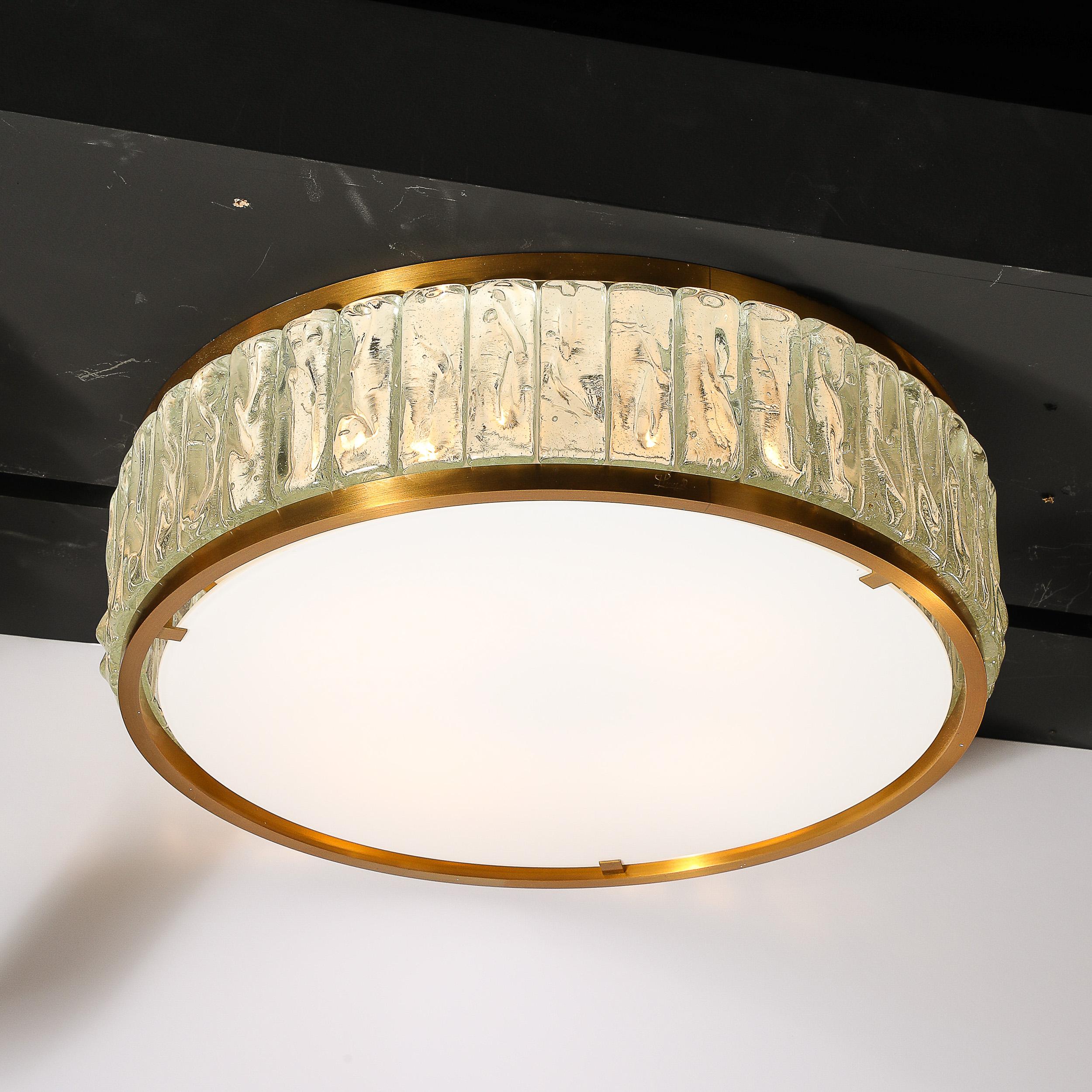This sophisticated and materially exquisite Mid-Century Modernist Round Flush Mount Chandelier in Textured & Frosted Glass with Brass Fittings is signed Jean Perzel and originates from France during the latter half of the 20th Century. Features a