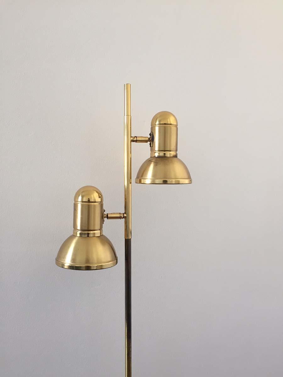 A beautiful mid-century brass floor lamp, manufactured in 1970 in Czechoslovakia.

This unique lamp has a brass frame with 2 rotatable brass shades. When switched on, the light coming from the lamp brightens the room absolutely beautifully! It is