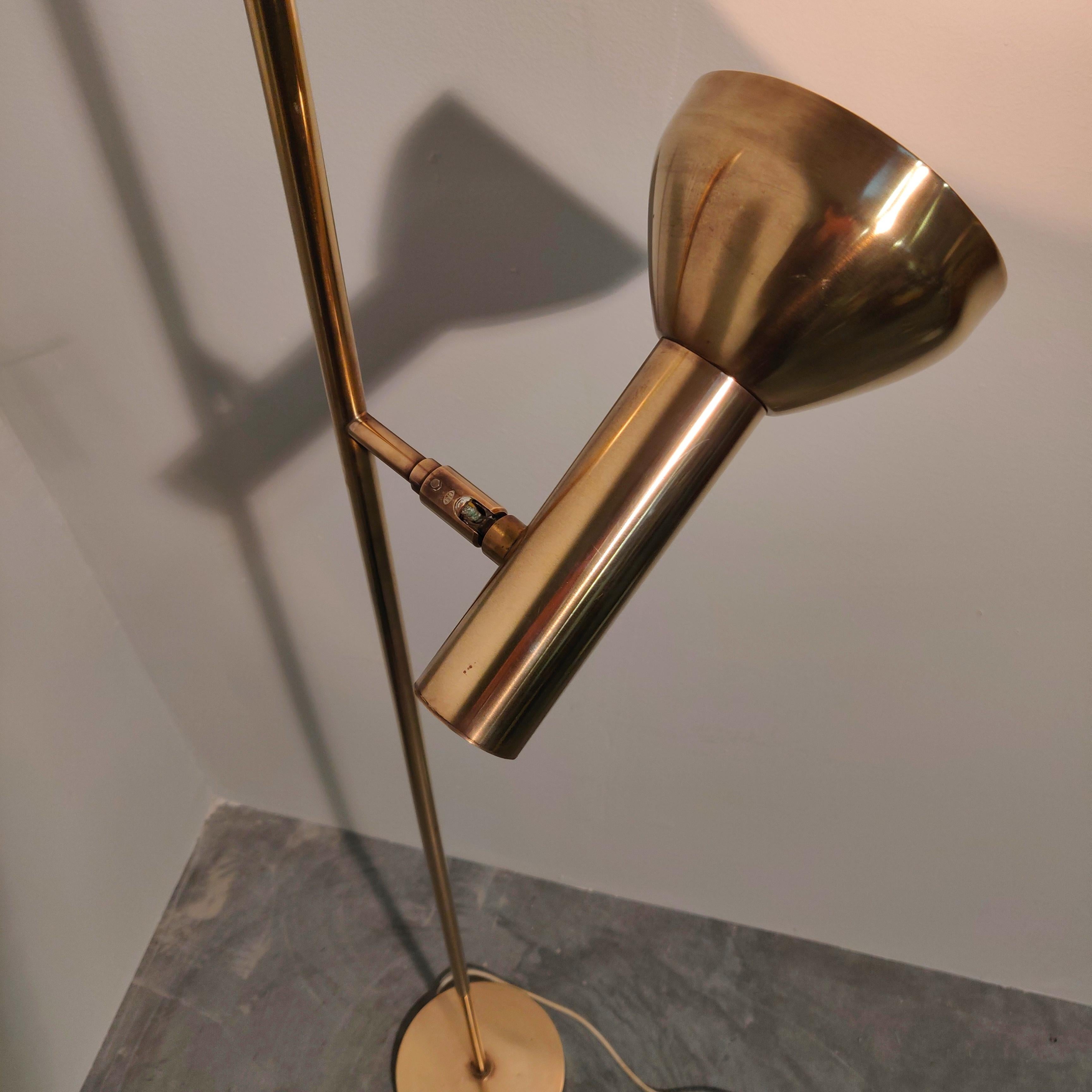 Full brass single shade floor lamp by Cosack Leuchten, 1960s, Germany. 
Heavy brass. Minimal design Very high quality. Fully functional.

This 1960s Brass Cosack floor lamp exists in several versions. Other lampshades were used with the same base
